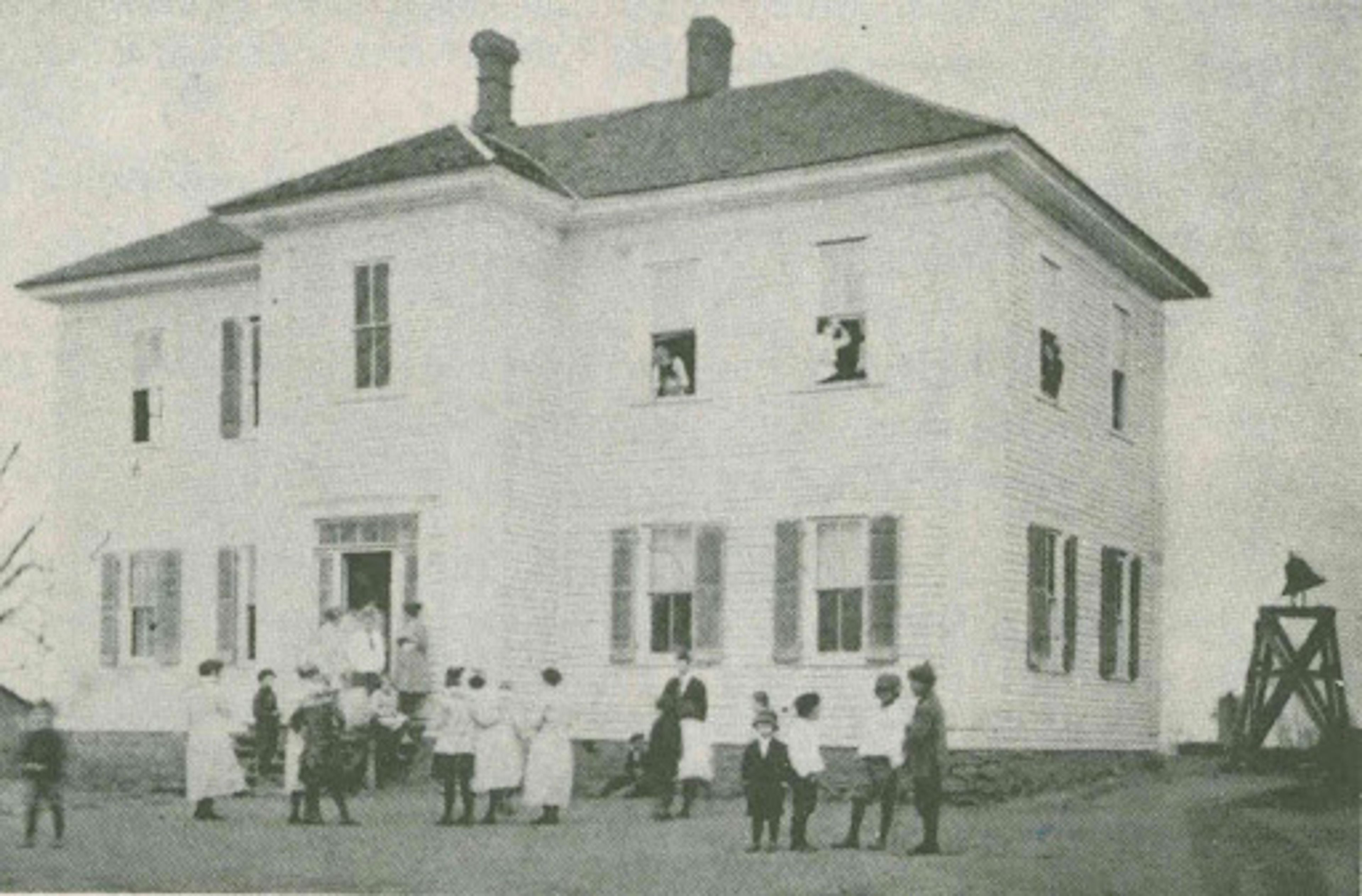 The original Oak Ridge Schoolhouse was a two-story, four-room frame house built in 1874.