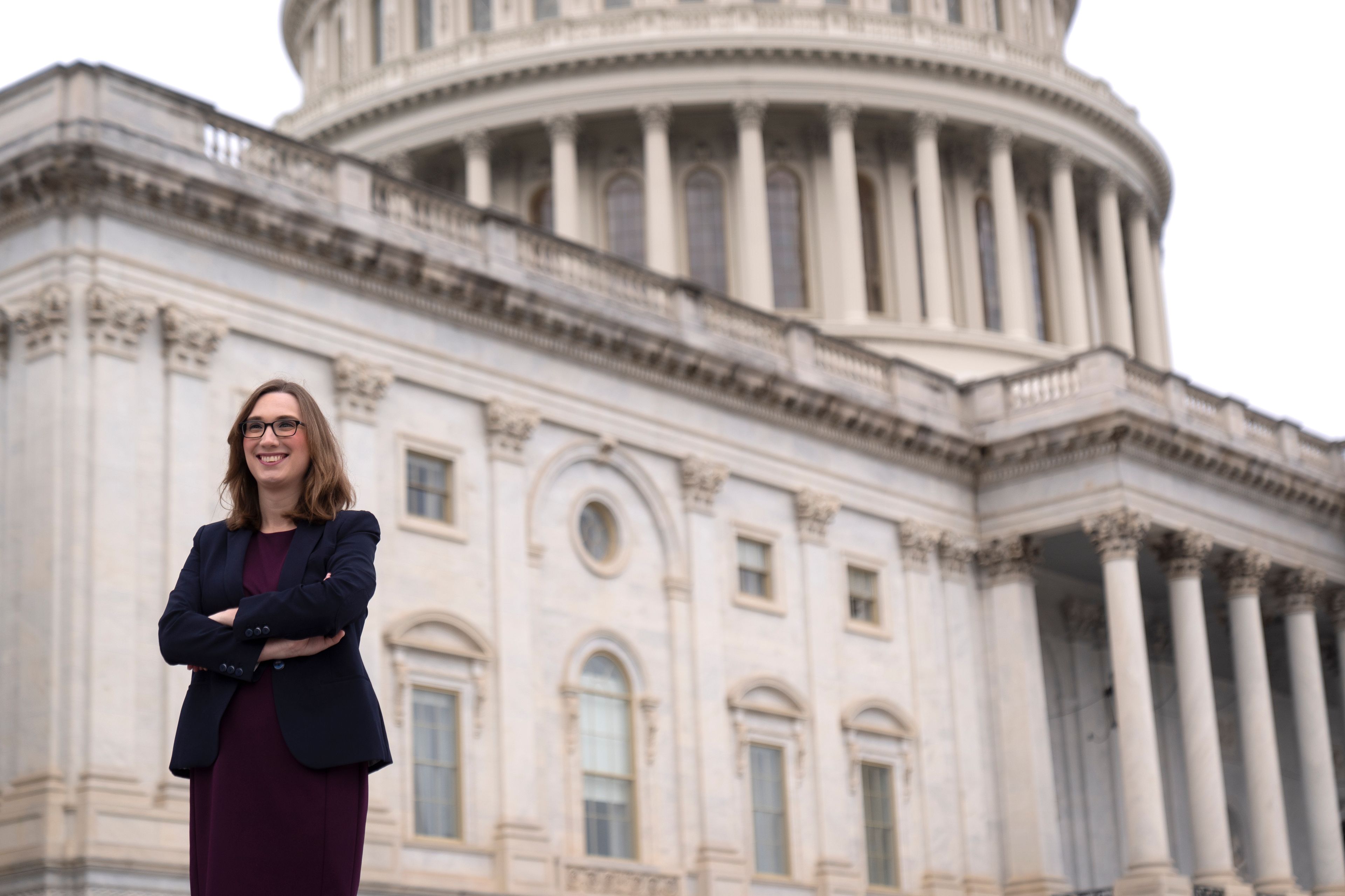 Rep.-elect Sarah McBride, D-Del., poses for a photo as she stands on the Capitol steps, in Washington, Friday, Nov. 15, 2024. (AP Photo/Mark Schiefelbein)