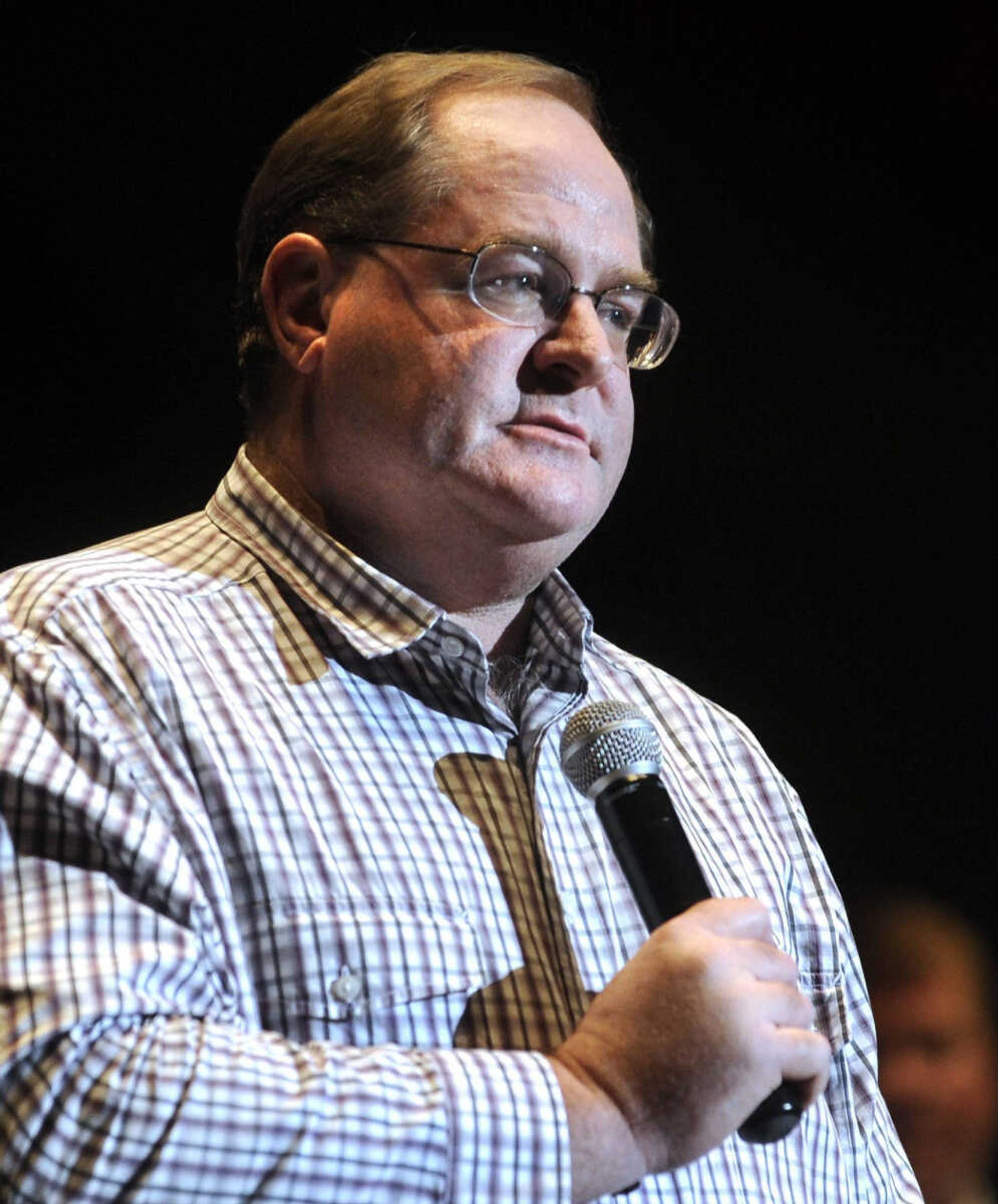 Teen Challenge alumnus Jerry Copeland speaks about his experience with the ministry at its annual banquet Saturday, April 13, 2013 at the Show Me Center. (Fred Lynch)