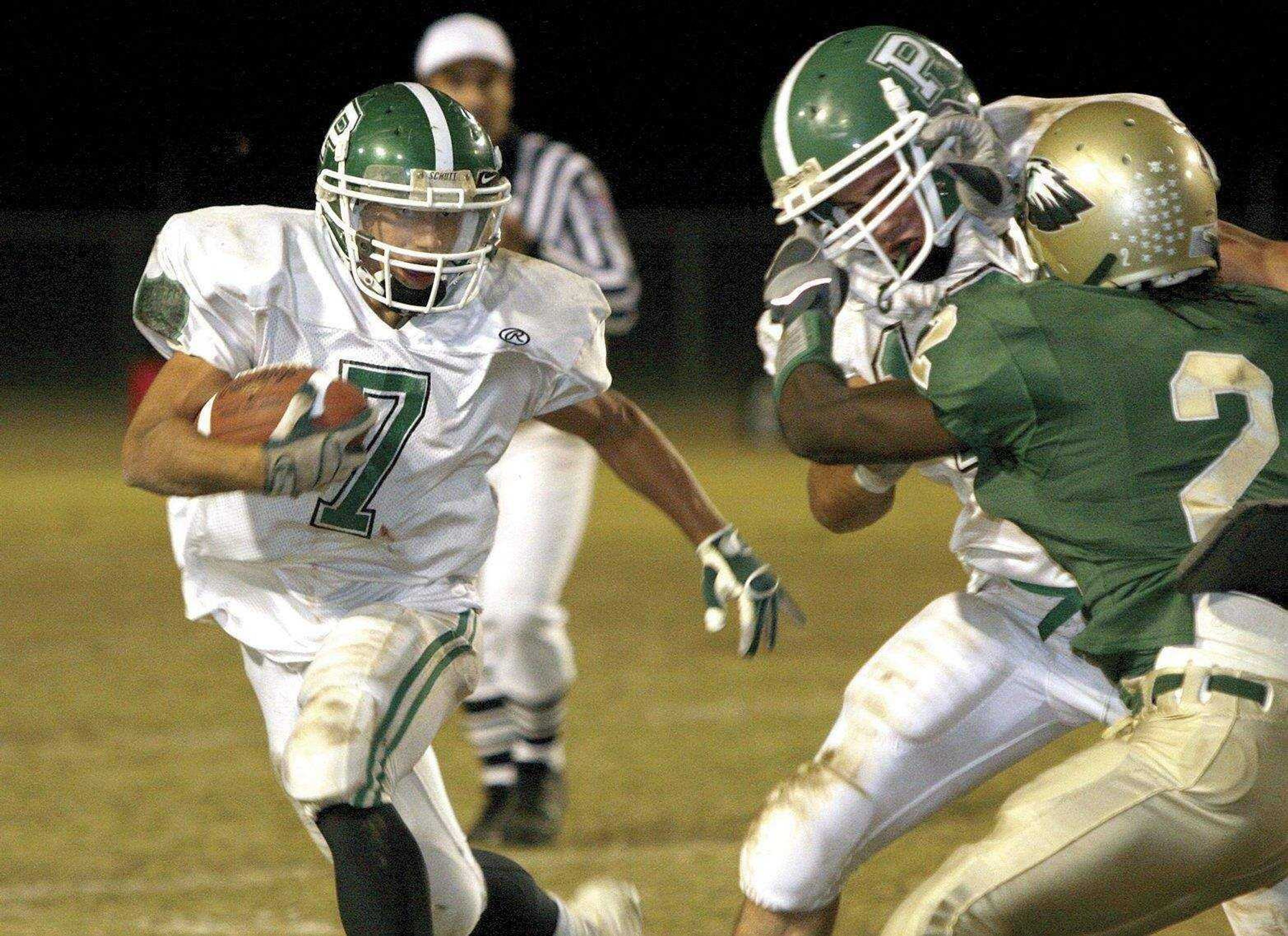 DAVID JENKINS ~ Sikeston Standard-Democrat<br>Perryville's Josh Perreault runs for yards during Thursday's game at New Madrid County Central.