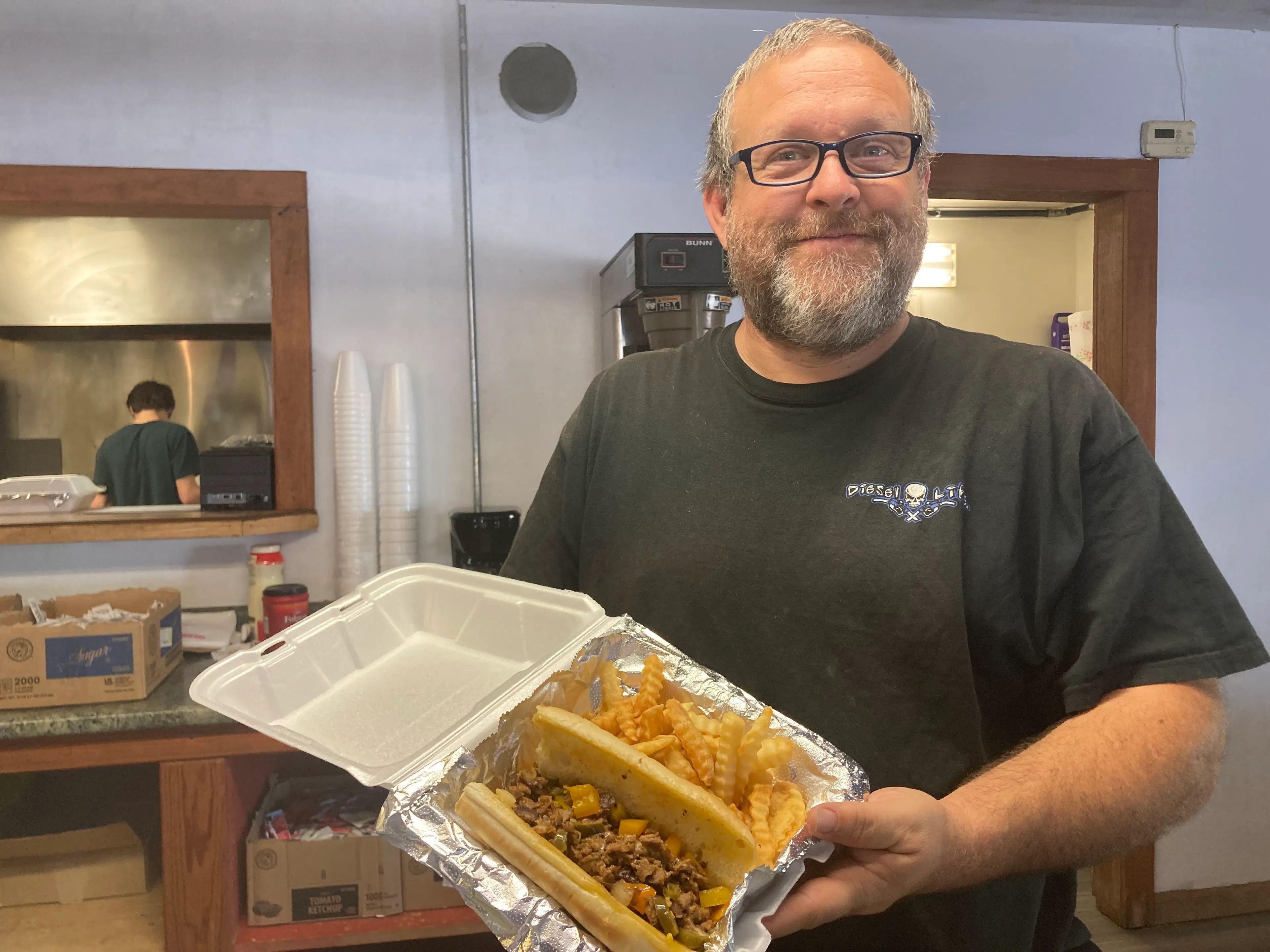 William Rosevelt showcases some cheesesteaks at Layla's Cheesesteaks in Marble Hill. The restaurant, named for his daughter, sells a variety of items and is open 7 a.m. to 7 p.m.