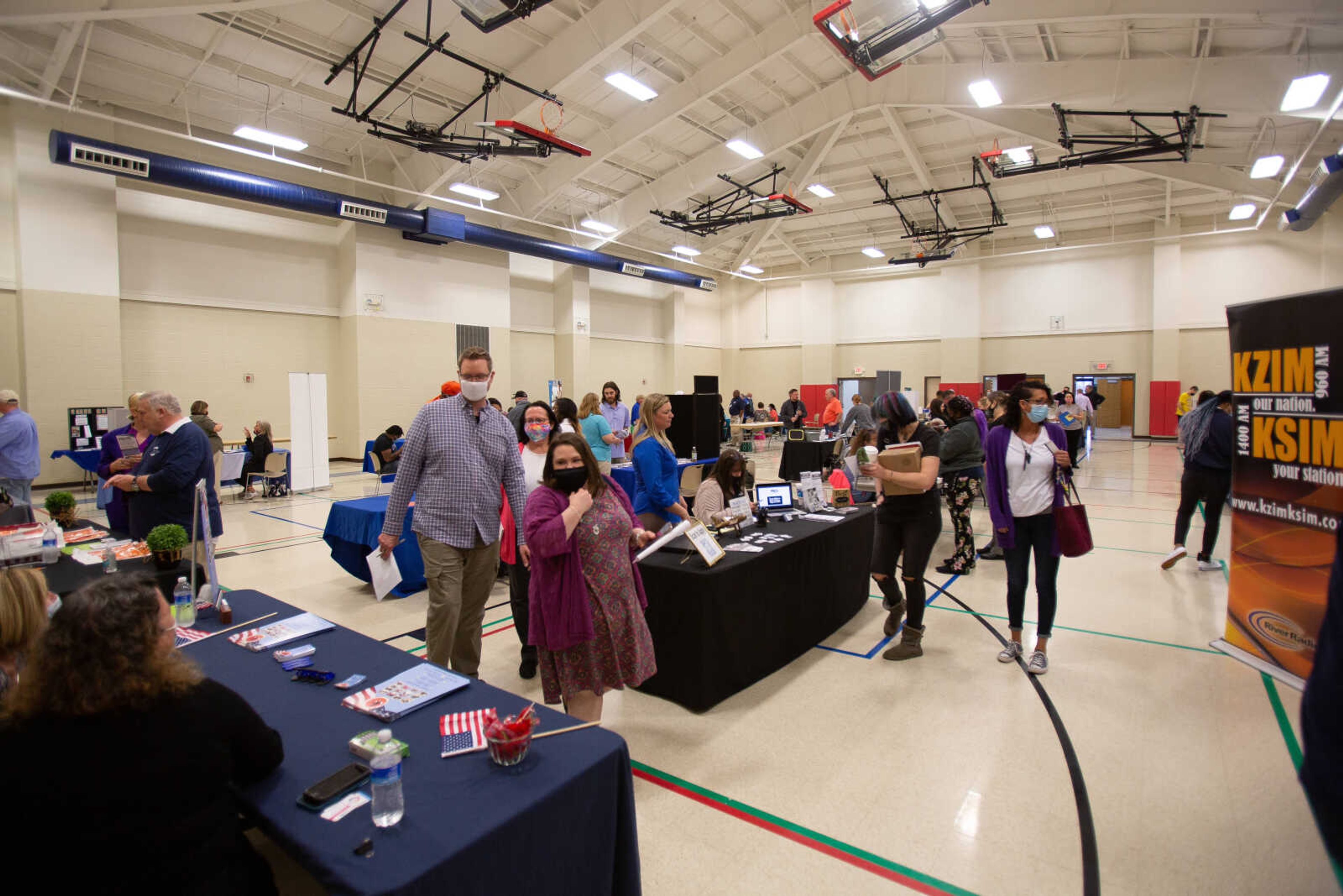 Employers, agencies and job-seekers mingle during a job fair at Project C.A.P.E. at the Shawnee Park Center on Thursday, March 25, 2021. The hiring event was designed to identify solutions to local workforce issues, according to the Cape Chamber's Facebook page.