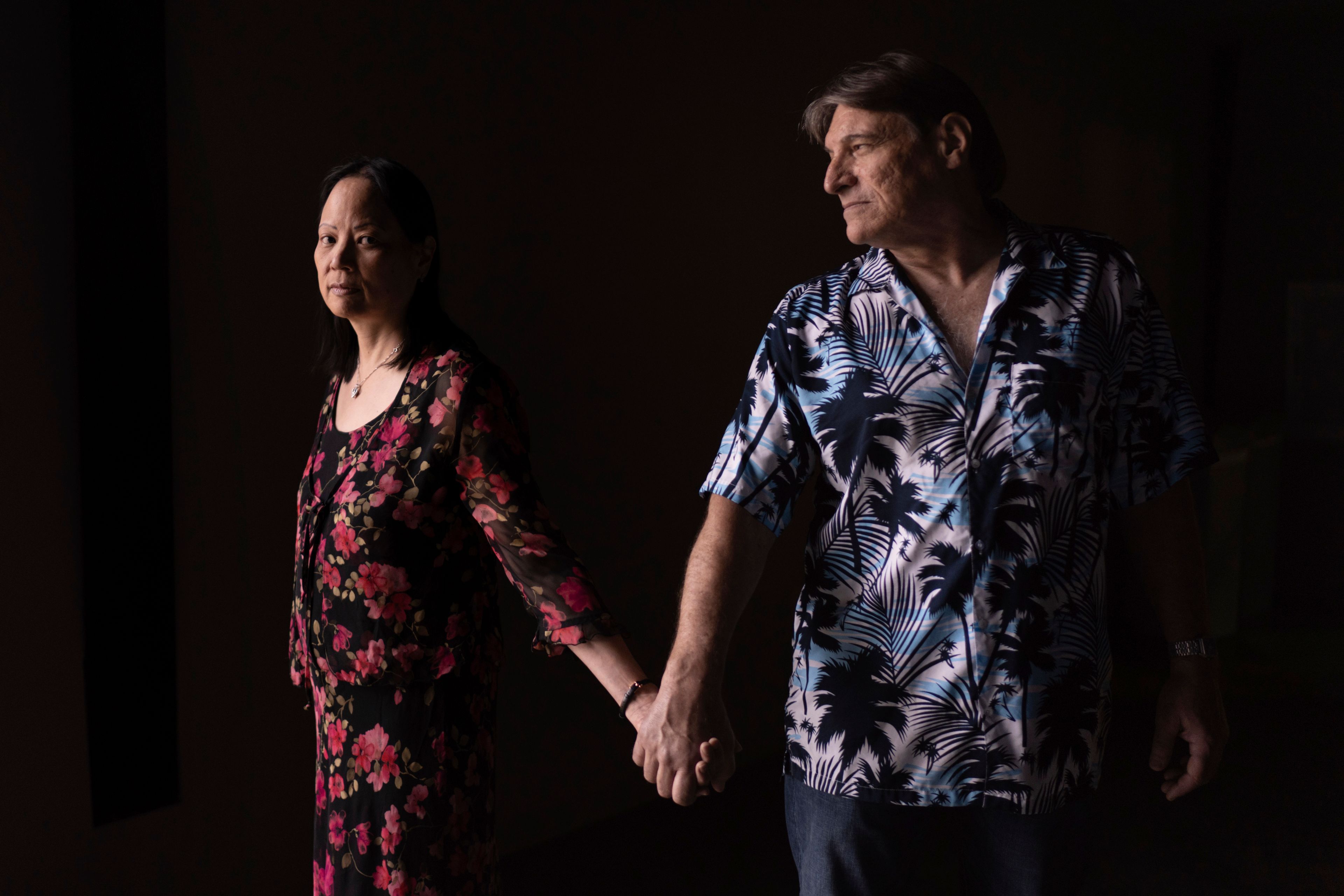 Lesley, left, and Matt Dzik, pose for a portrait in Urbana, Ill., Sunday, Sept. 22, 2024. Lesley, a Republican, and Matt, a Democrat, have navigated issues common to so many marriages, from parenting to money. But politics? That's complicated. But love overcomes political differences for this couple. (AP Photo/David Goldman)