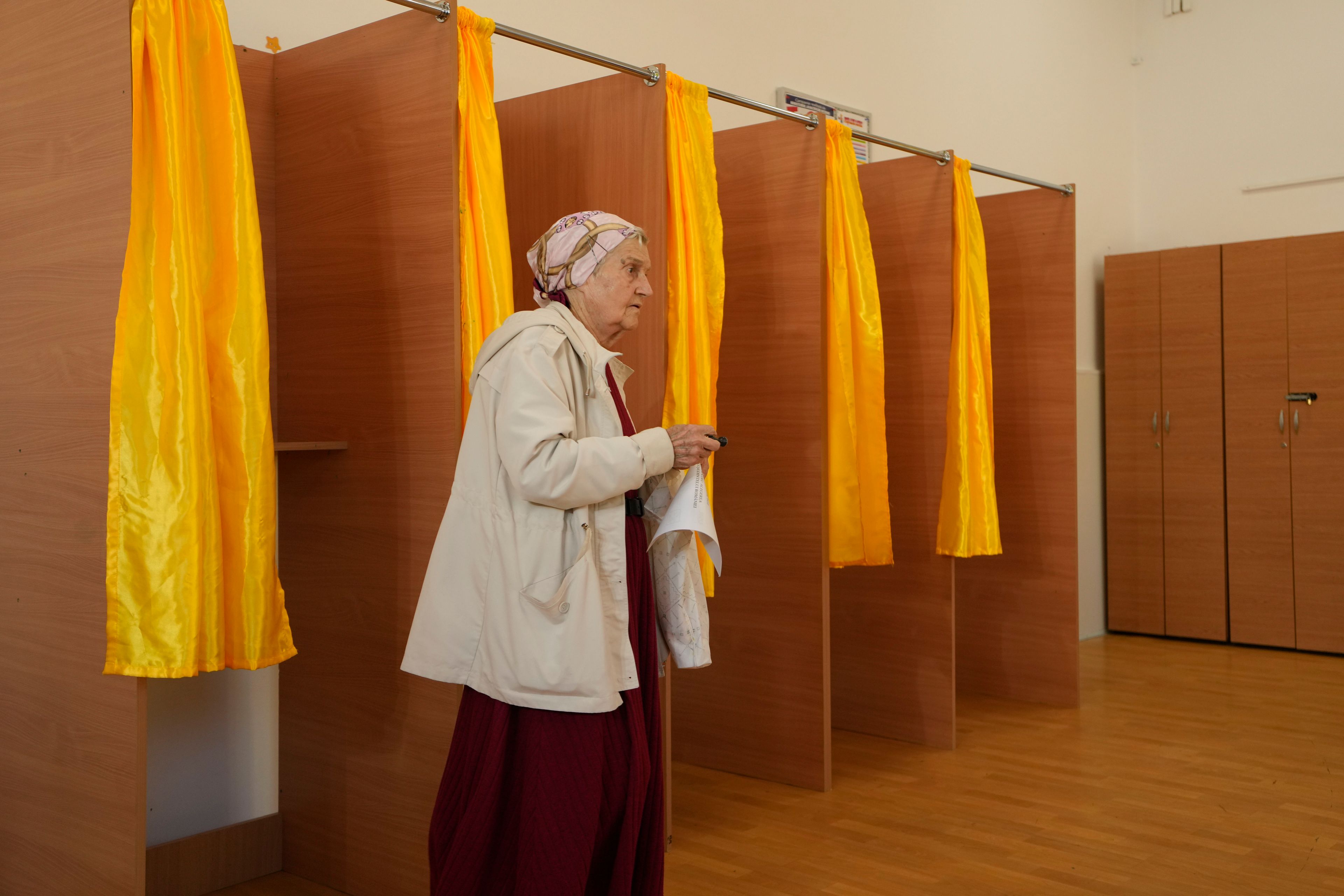 Romanians vote in a presidential redo after voided election sparked deep political crisis