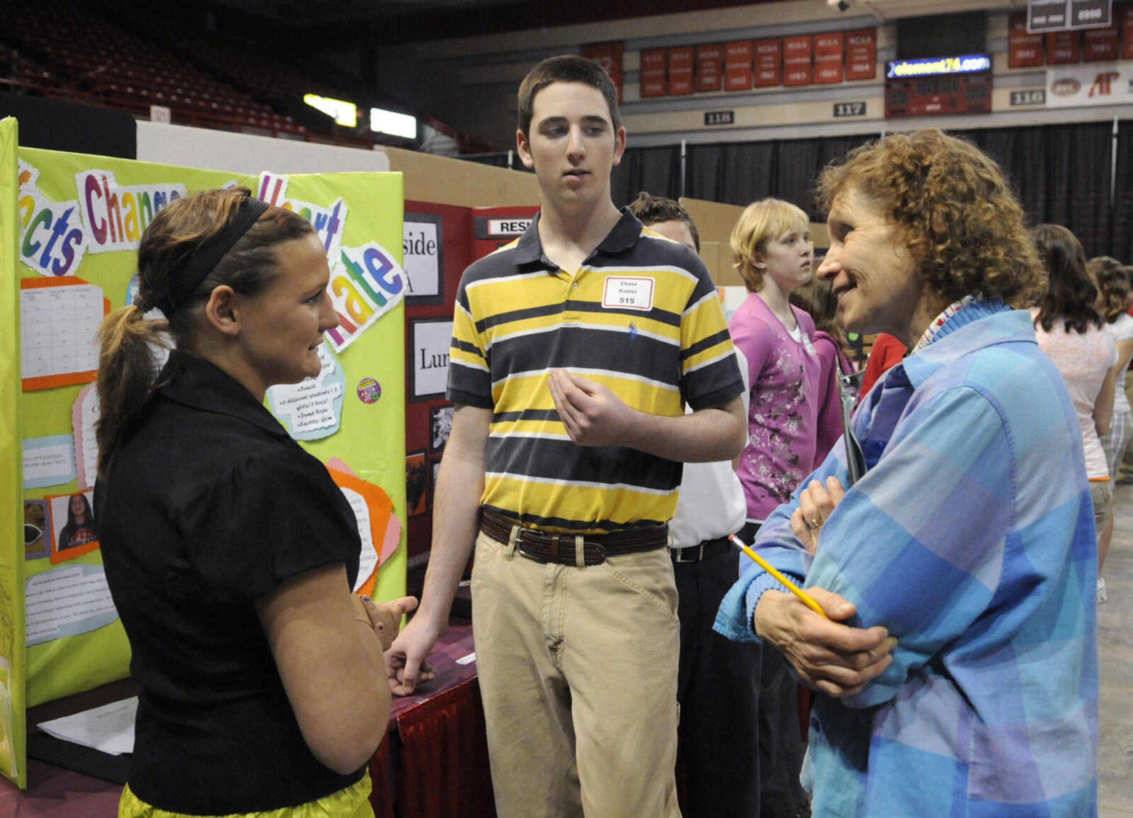 KRISTIN EBERTS ~ keberts@semissourian.com

Delta eighth-graders Megan Perry, 13, left, and Chase Kohler, 15, right, talk with judge Marycarol Baker about their project measuring the effects of age on heart rate during the 54th Annual Southeast Missouri Regional Science Fair at the Show Me Center on Tuesday, March 9, 2010.