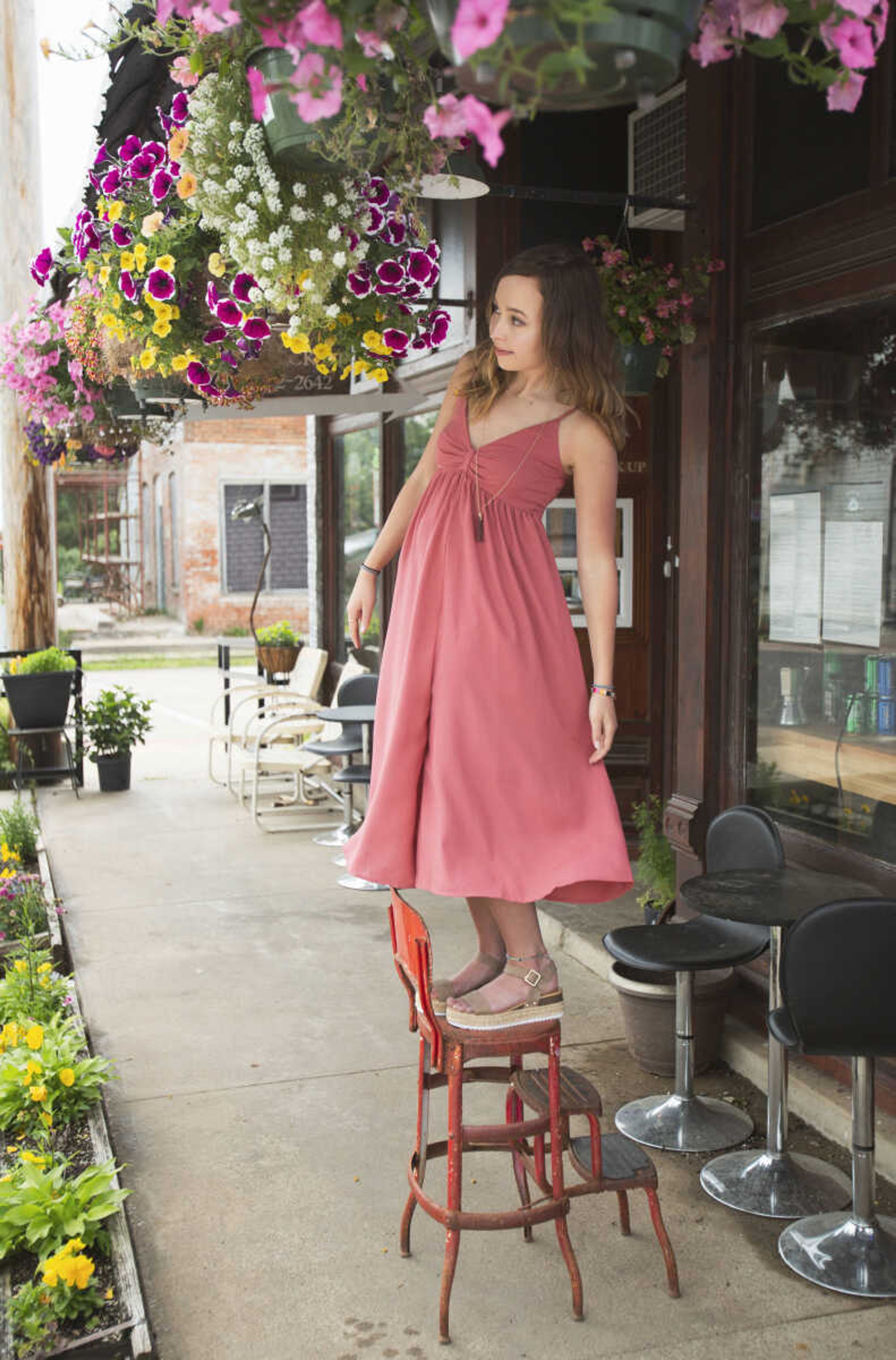 Emily Sachs models clothes, shoes and jewelry from Jenny May Boutique in Cape Girardeau.