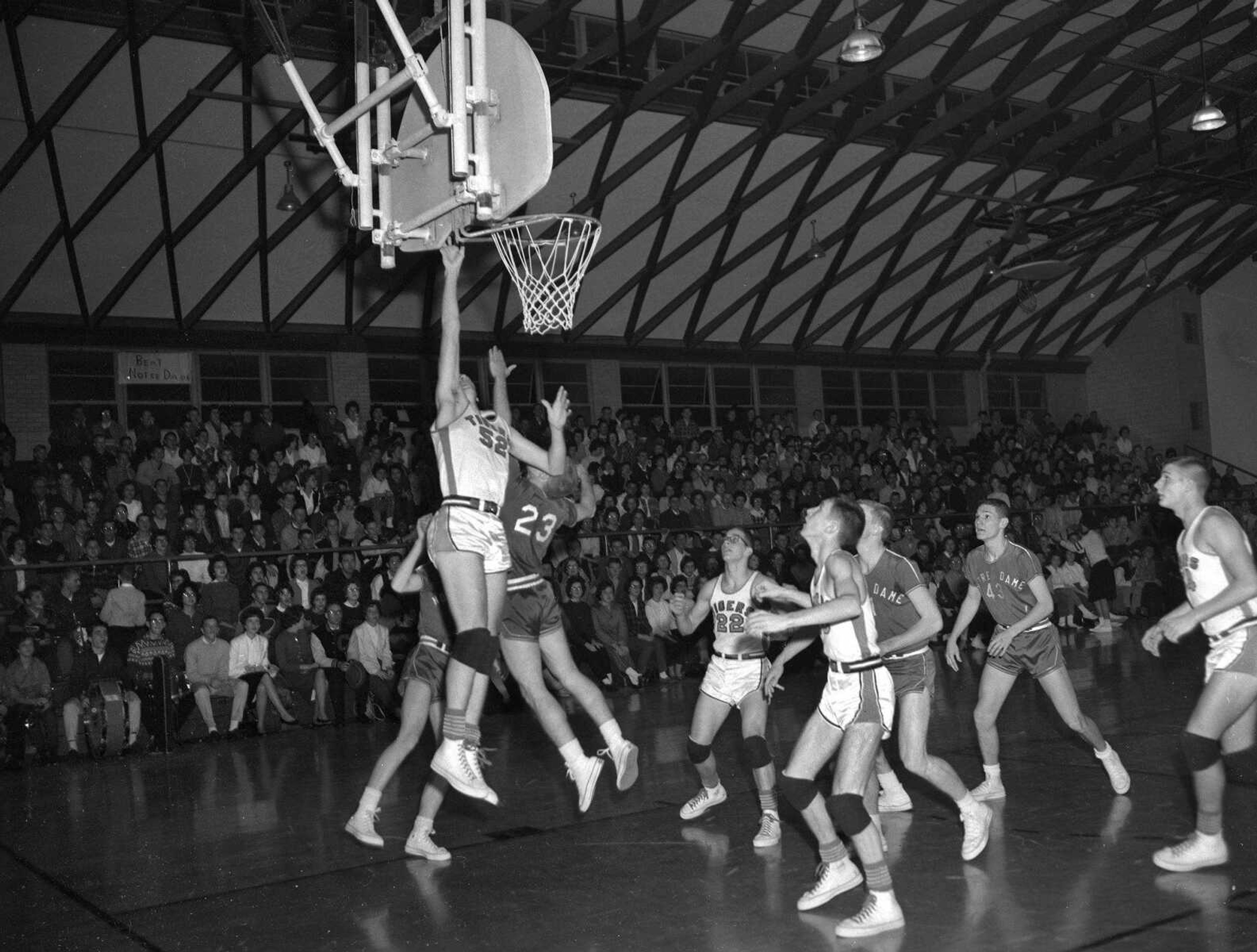 The Cape Girardeau Central Tigers hosts Notre Dame for a game in the old Central basketball gymnasium in this undated photo, probably the early 1960s.