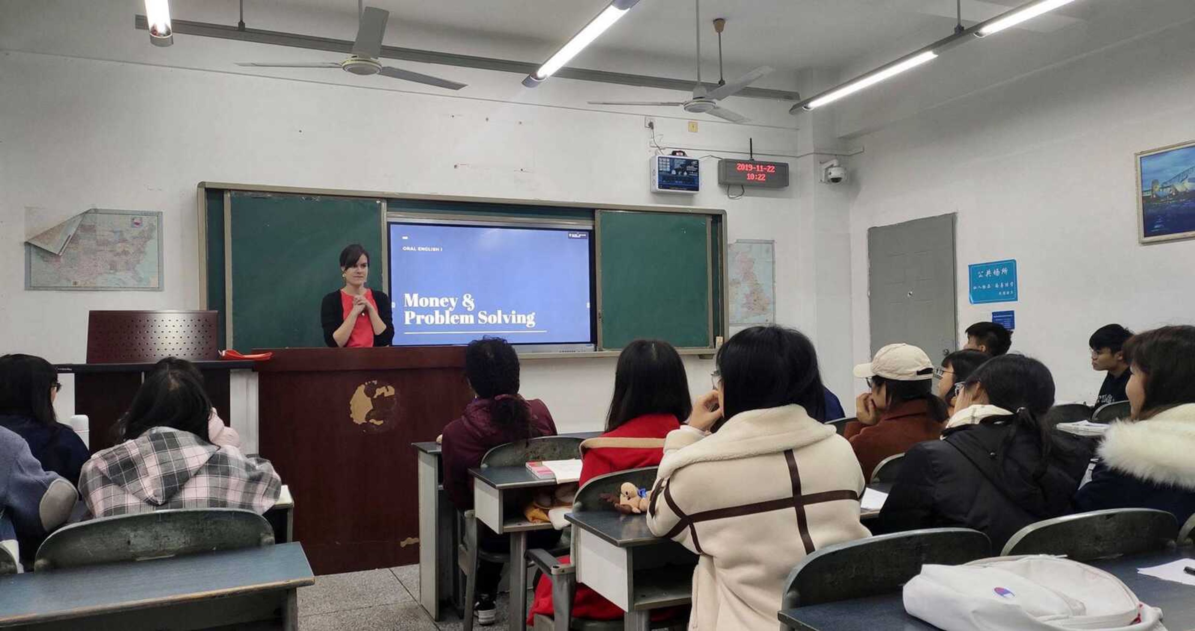 Ashley Books teaches oral English to a group of freshmen in November 2019 at Chengdu University of Information Technology.