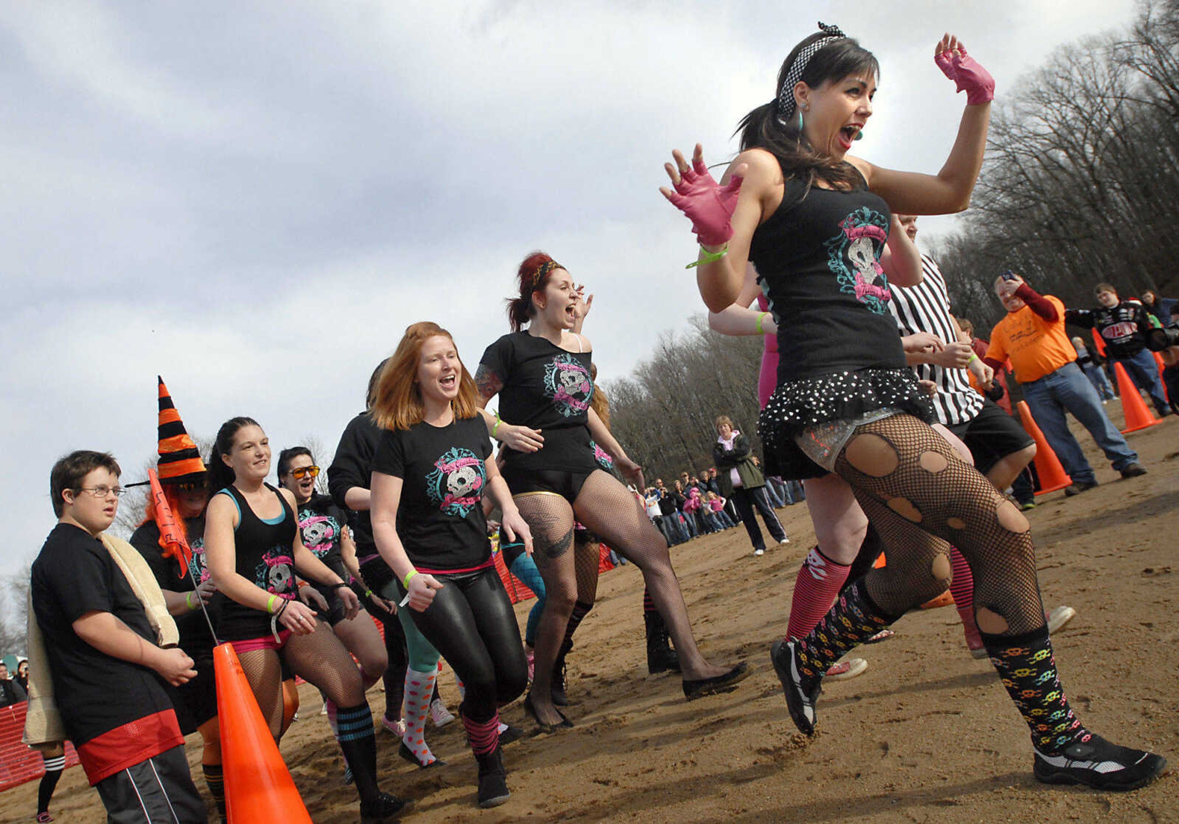 KRISTIN EBERTS ~ keberts@semissourian.com

The Cape Girardeau Roller Girls sprint into the water during the 2012 Polar Plunge at the Trail of Tears State Park's Lake Boutin on Saturday, Feb. 4, 2012.