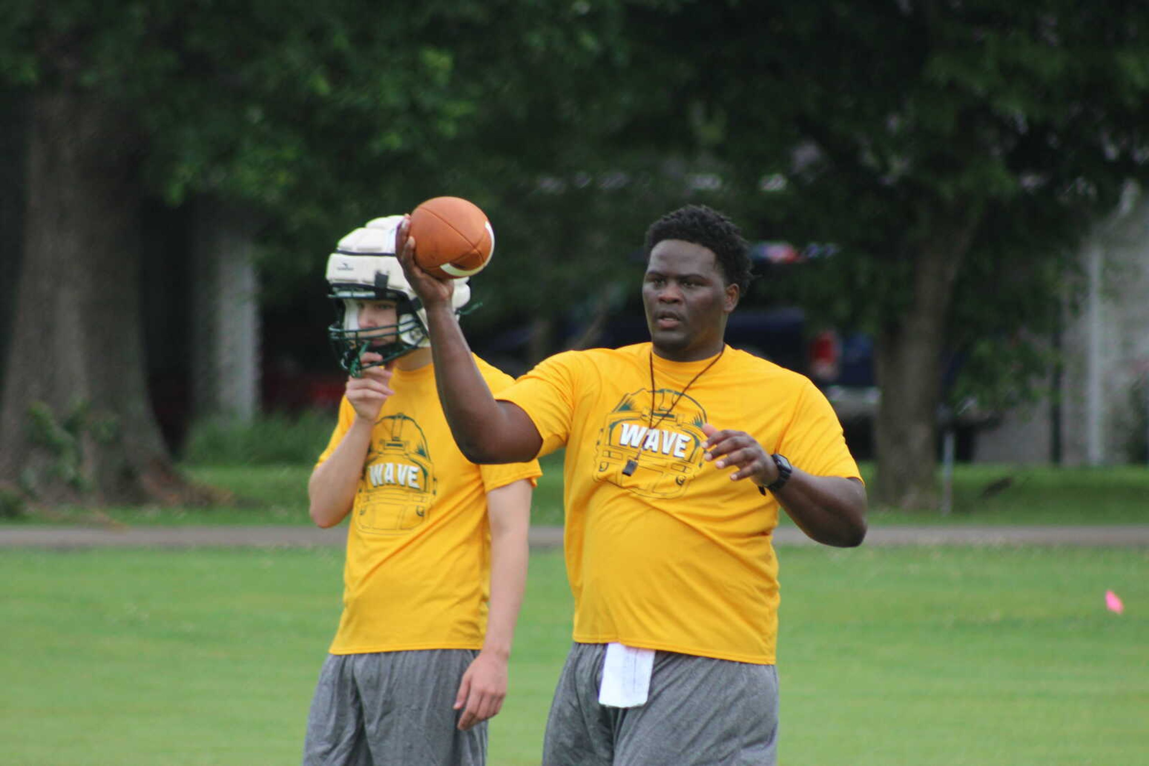 Pulley leads drill for receivers to practice their routes. Photo by Kaelin Triggs, Delta Dunklin Democrat.