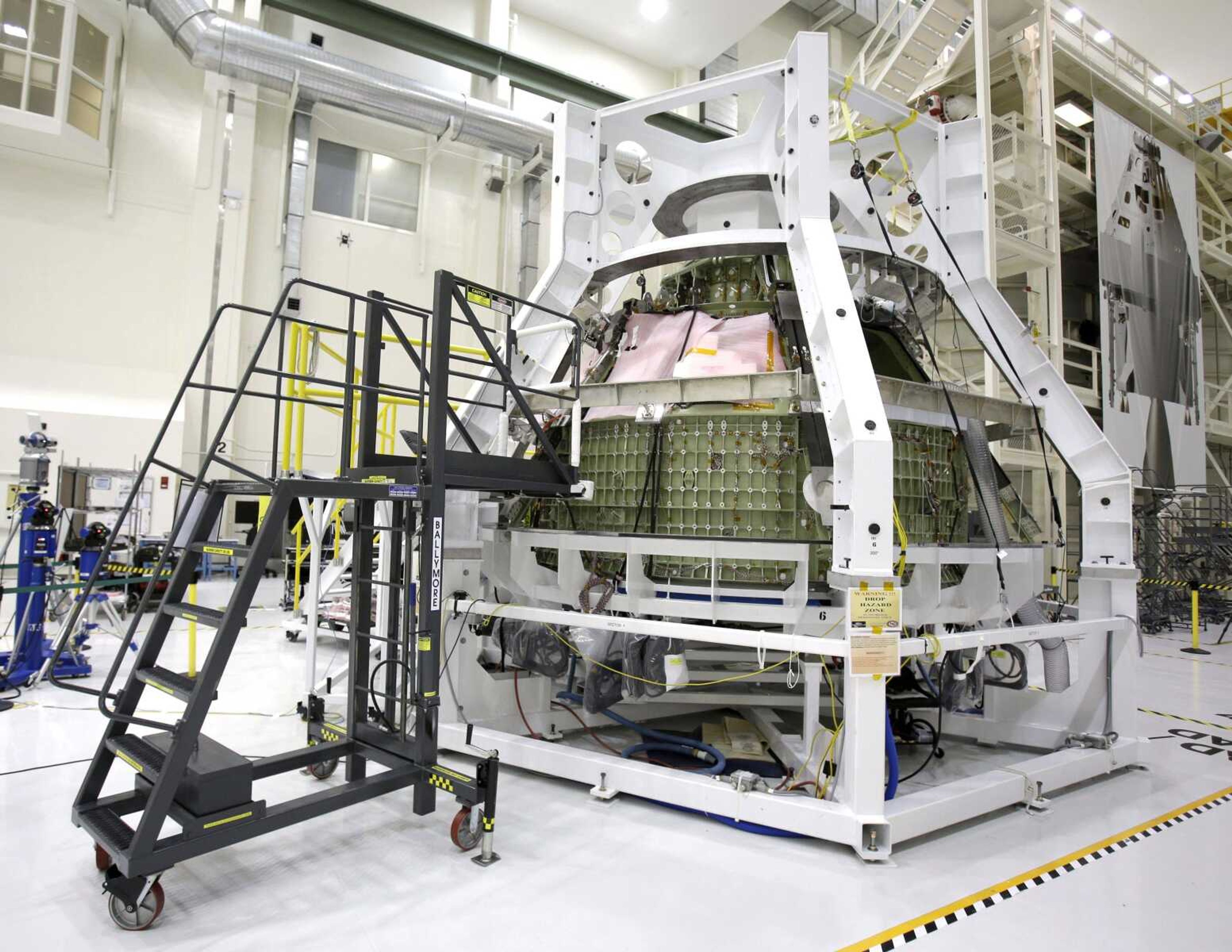 The Orion Exploration Flight Test 1 crew module is seen in the Operations and Checkout building during a media tour Jan. 13 at the Kennedy Space Center in Cape Canaveral, Fla. (John Raoux ~ Associated Press)