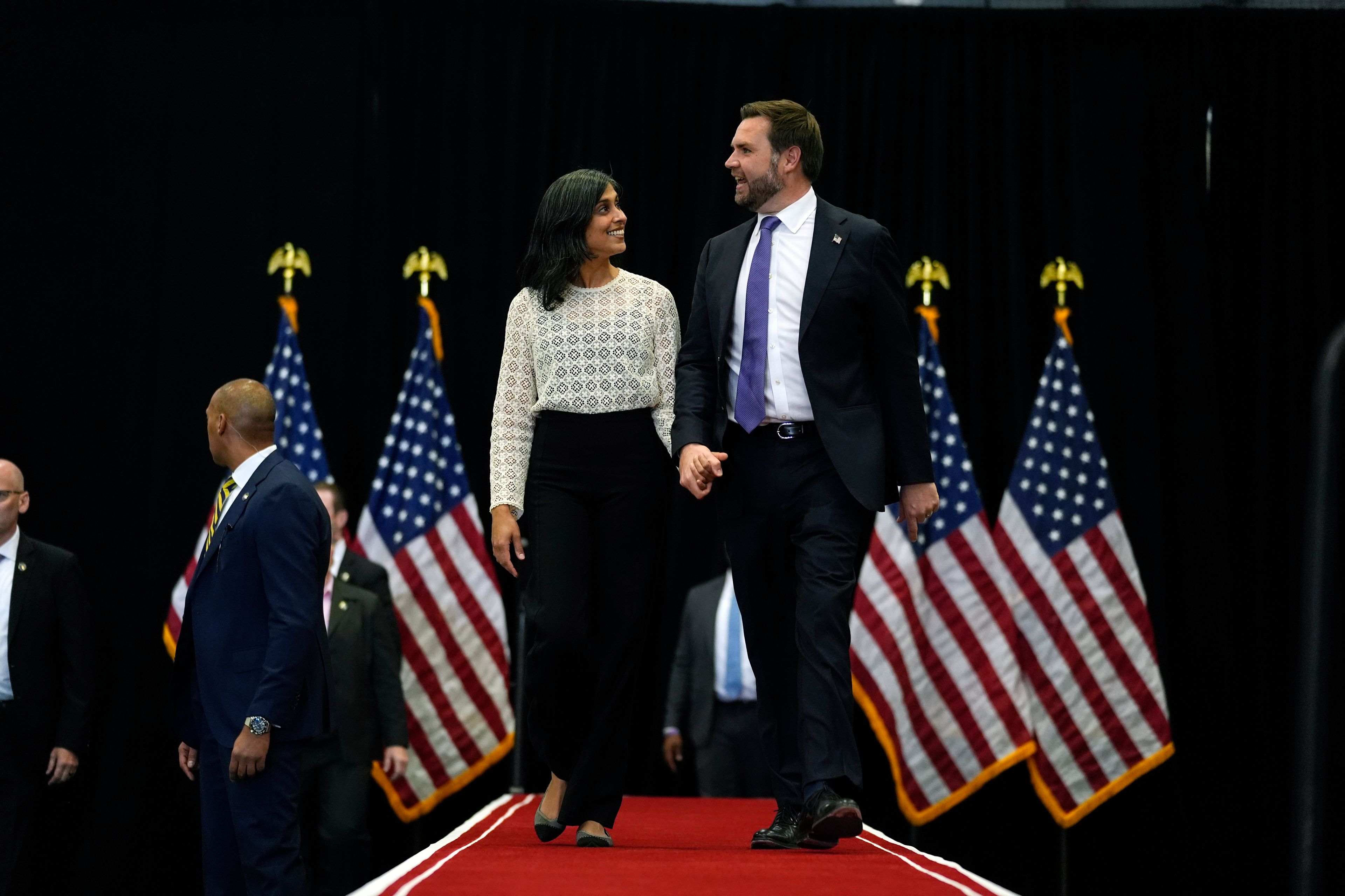 Republican vice presidential nominee Sen. JD Vance, R-Ohio, and his wife Usha Vance, arrive for a campaign event, Wednesday, Oct. 16, 2024, in Williamsport, Pa. (AP Photo/Matt Rourke)