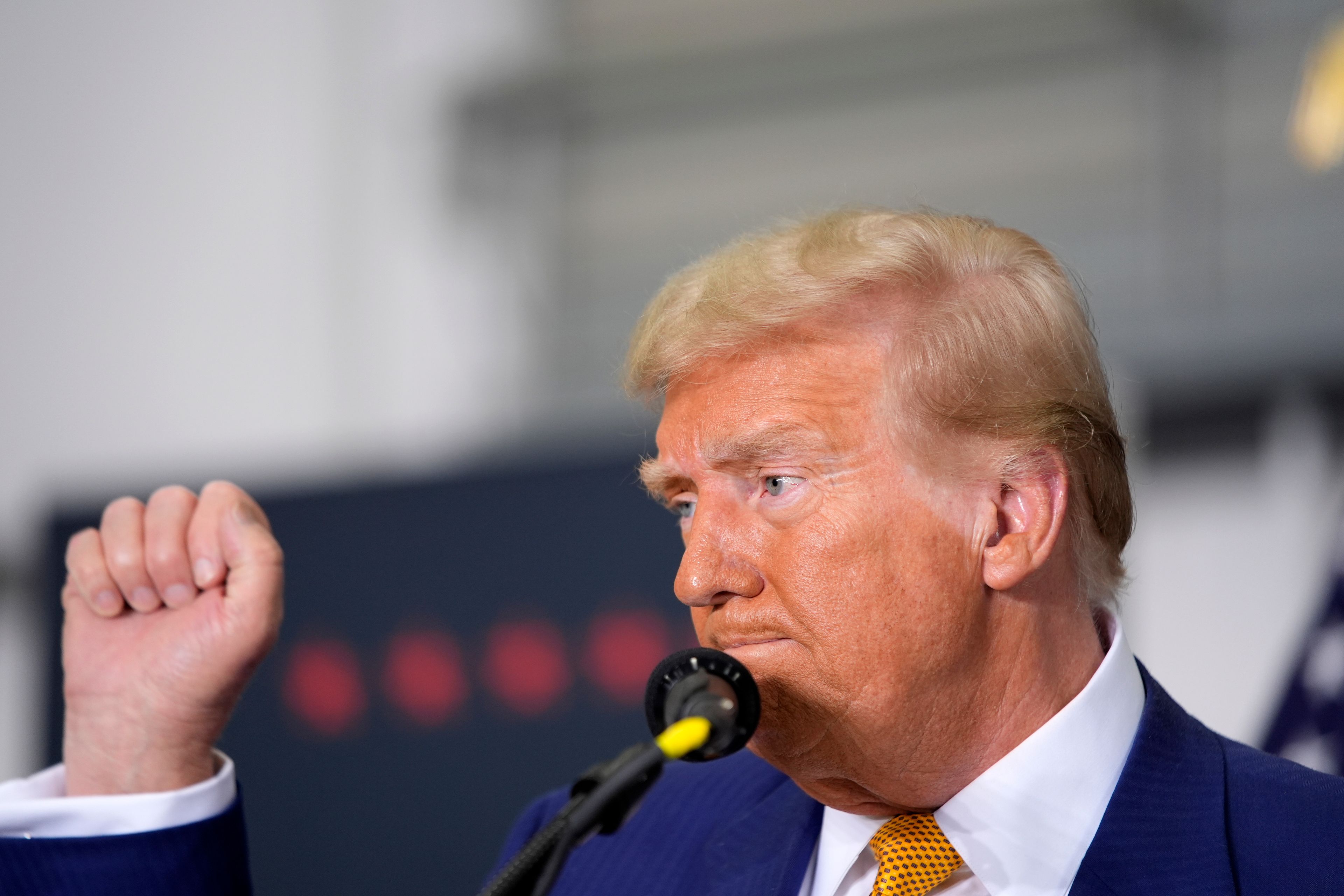 Republican presidential nominee former President Donald Trump gestures at the conclusion of a news conference at Austin-Bergstrom International Airport, Friday, Oct. 25, 2024, in Austin, Texas. (AP Photo/Alex Brandon)