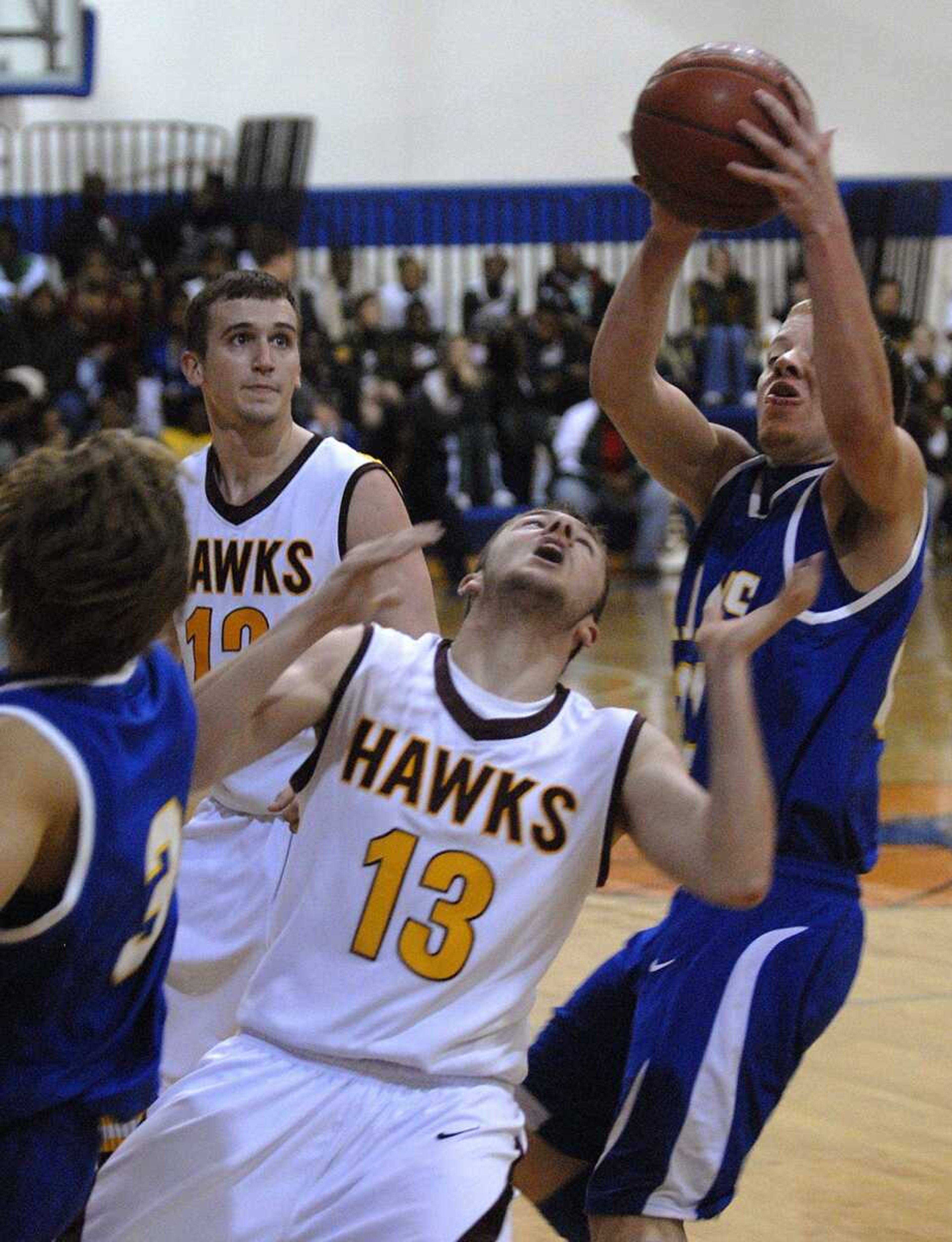 FRED LYNCH ~ flynch@semissourian.com
Scott City's James Glueck grabs the ball away from Kelly's Brett Harper during the third quarter of their first-round Class 3 District 1 game Monday at Charleston. Additional game photos can be viewed online at semissouran.com.