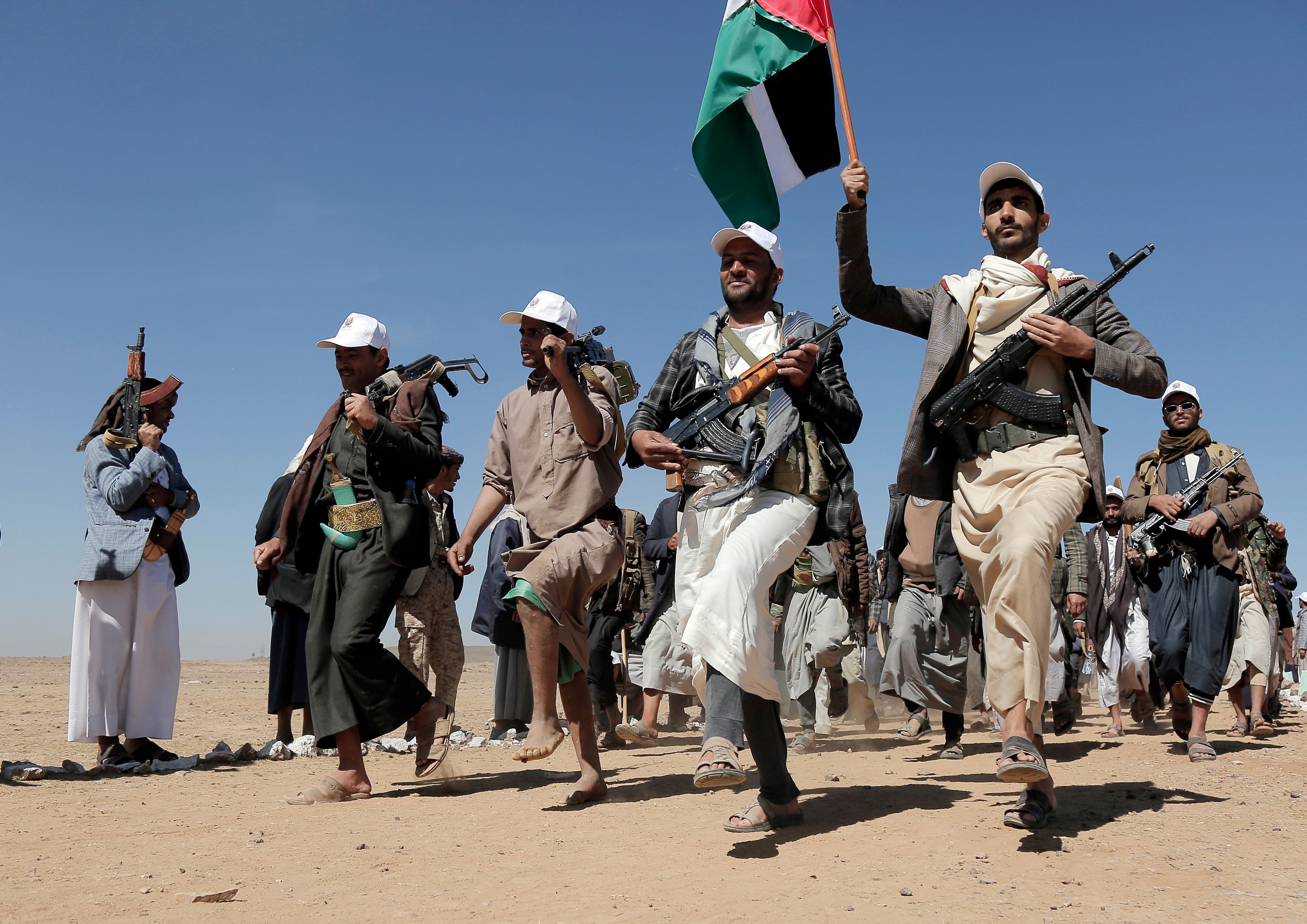 File - Houthi rebel fighters march during a rally of support for the Palestinians in the Gaza Strip and against the U.S. strikes on Yemen outside Sanaa on Jan. 22, 2024. (AP Photo, File)