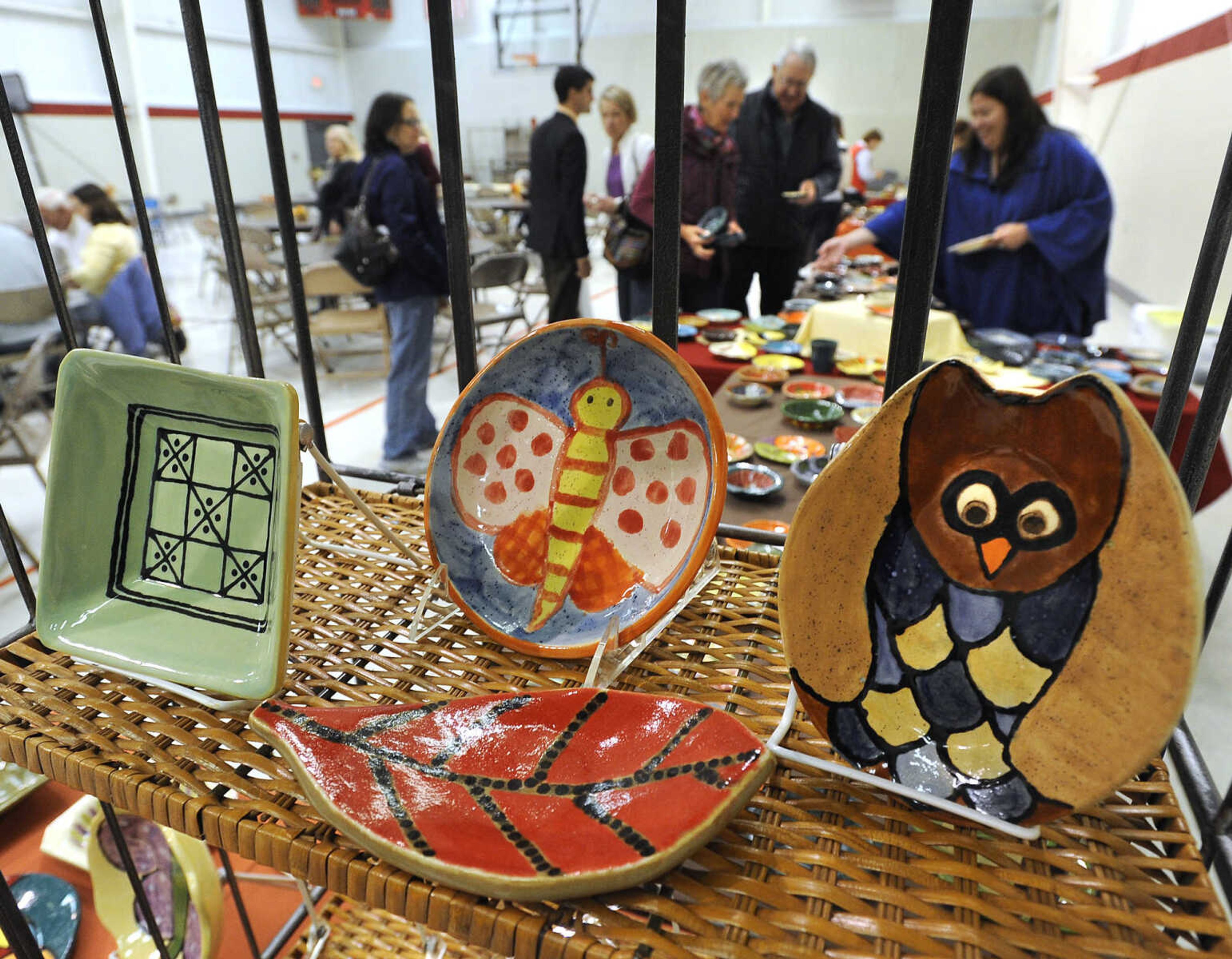 FRED LYNCH ~ flynch@semissourian.com
Handmade bowls await selection by patrons at the ninth annual Empty Bowls Banquet on Sunday, Nov. 2, 2014 at the Salvation Army Worship and Community Center in Cape Girardeau. Proceeds finance the organization's Meals with Friends program.