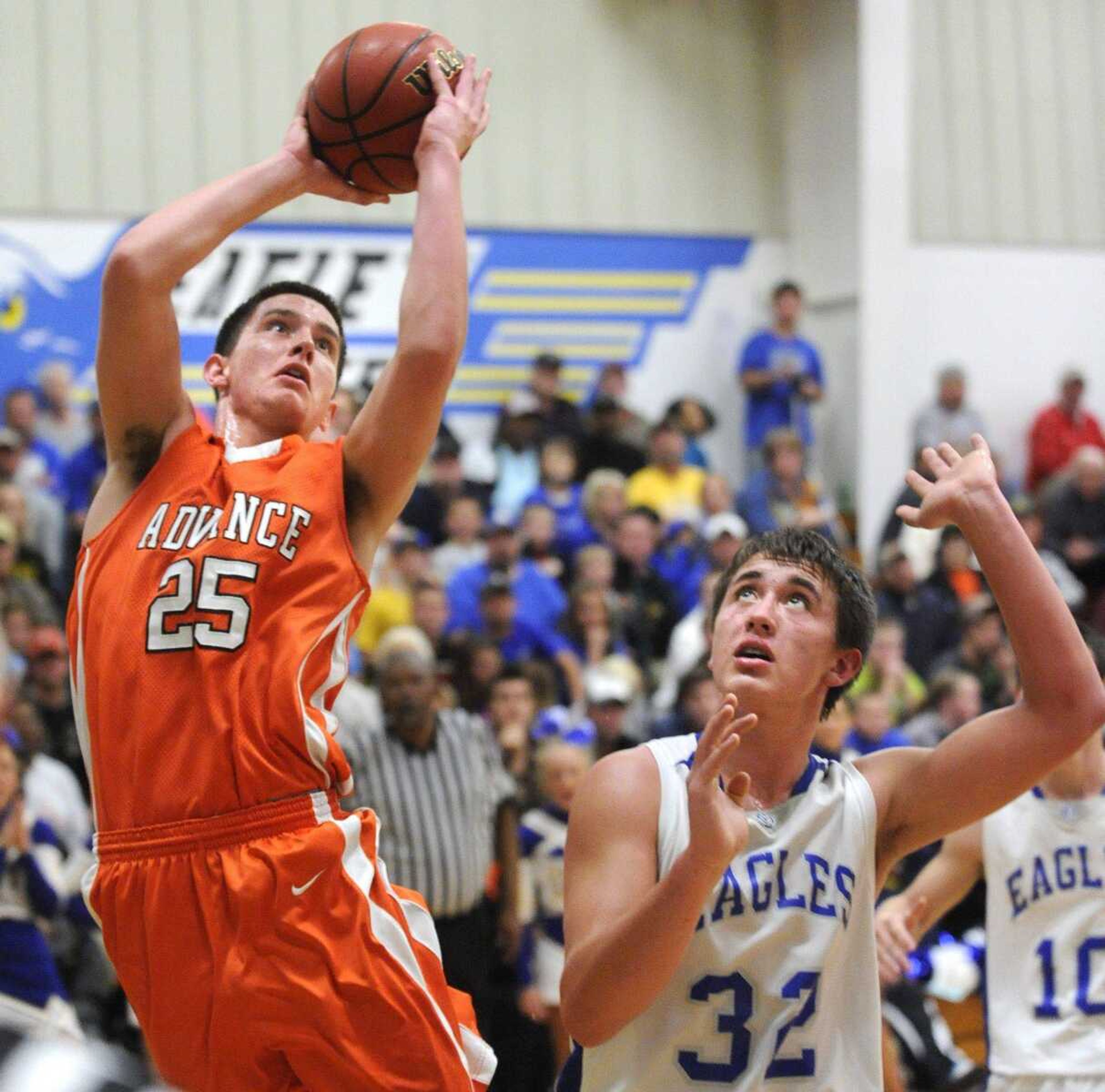 Advance&#8217;s Trey Wallace takes a shot over Oran&#8217;s Alex Heuring during the second quarter of the semifinal in the Oran Invitational on Thursday in Oran, Mo. Advance won 71-56. (Fred Lynch)