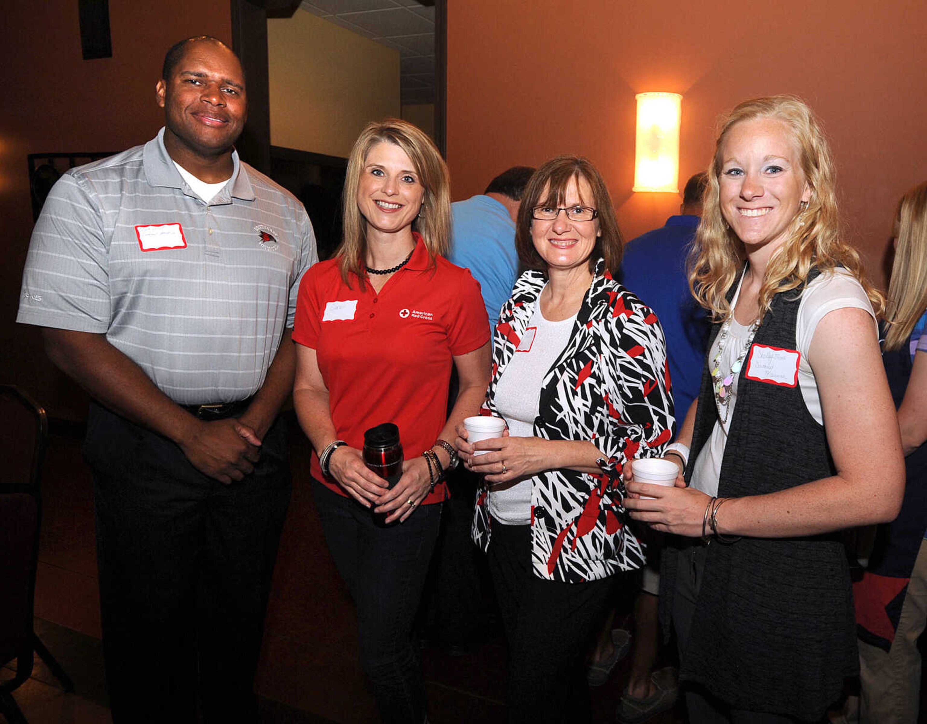 Mark Alnutt with Southeast Missouri State University, Sara Gerau with the American Red Cross, and Gera LeGrand and Shelley Frank with the Southeast Missourian.