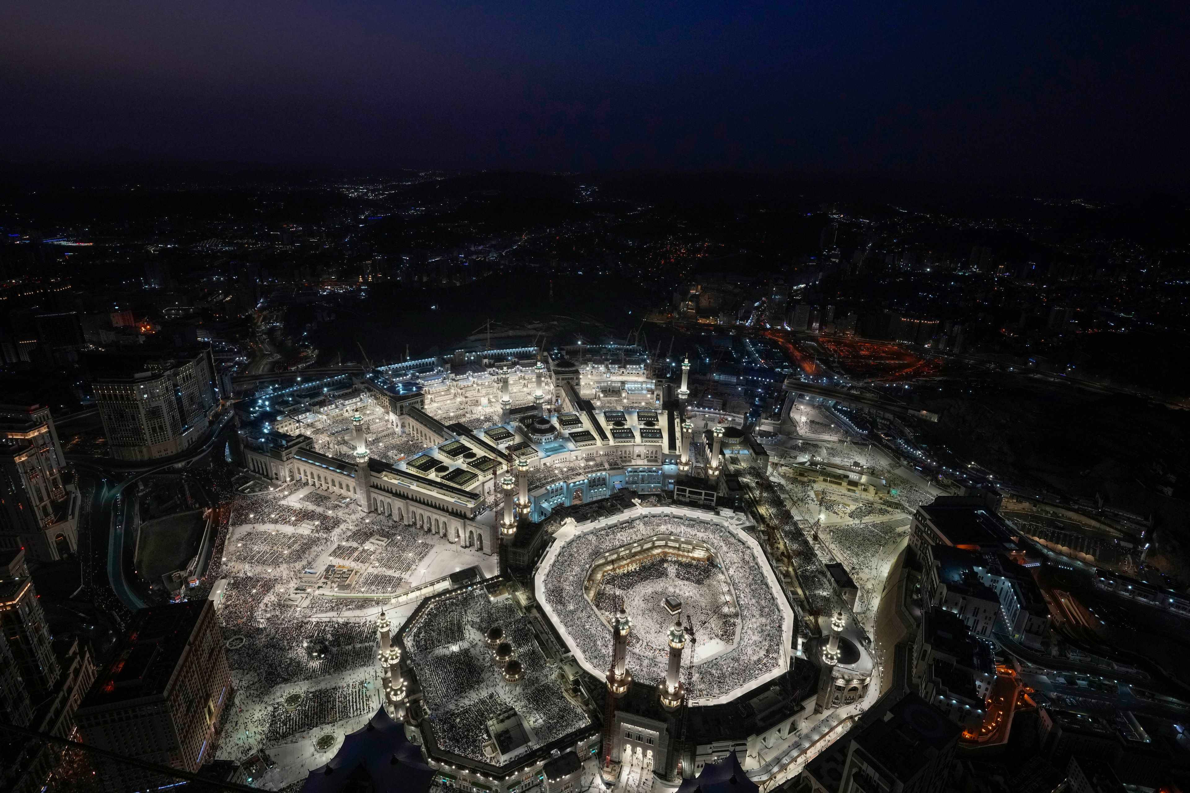 Muslim pilgrims circumambulate the Kaaba, the cubic building at the Grand Mosque, during the annual Hajj pilgrimage in Mecca, Saudi Arabia, on June 11, 2024. (AP Photo/Rafiq Maqbool)