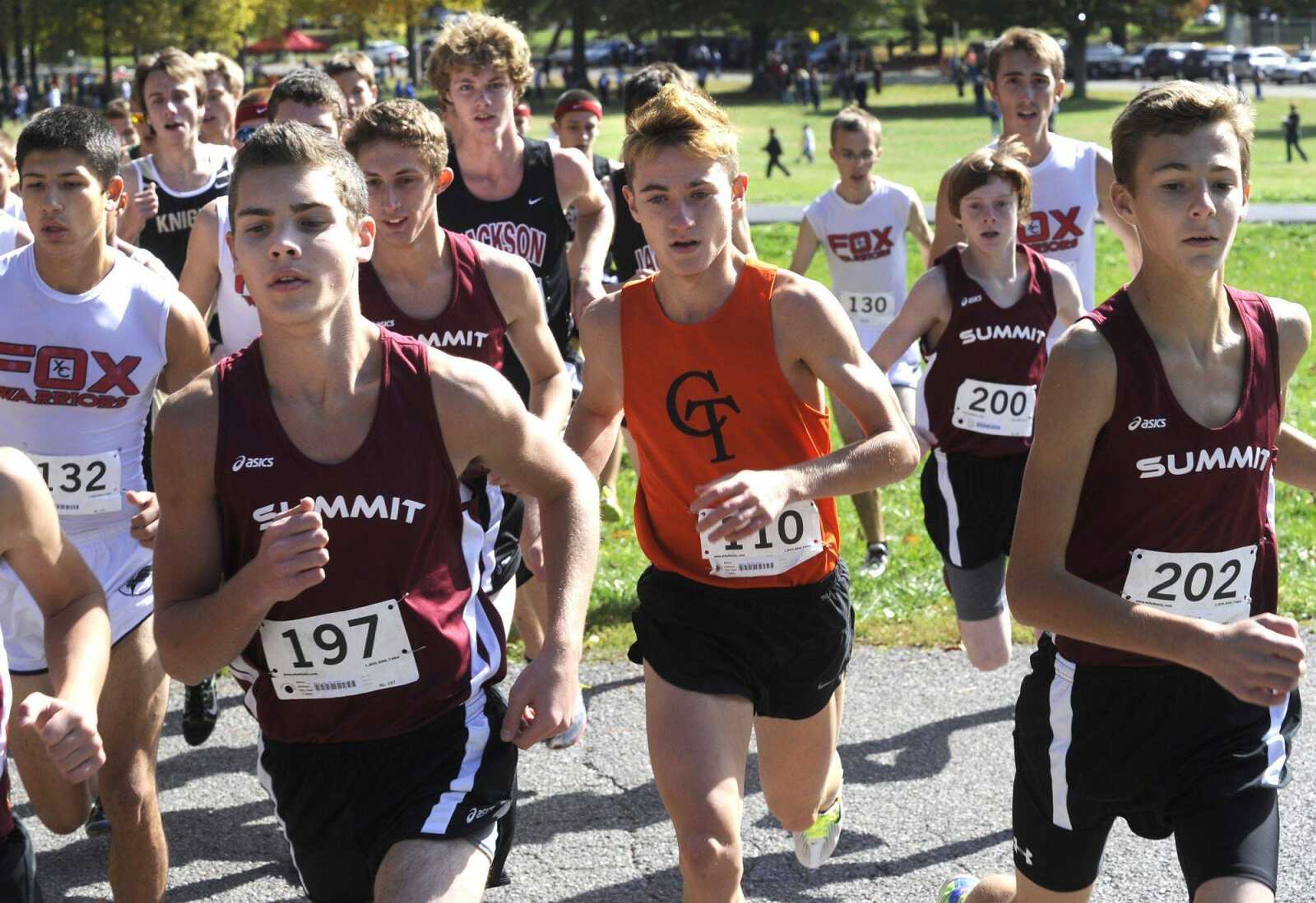 Central&#8217;s Billy Leighton, center, begins the boys Class 4 District 1 cross country race Saturday at Jackson City Park.<br>FRED LYNCH<br>flynch@semissourian.com