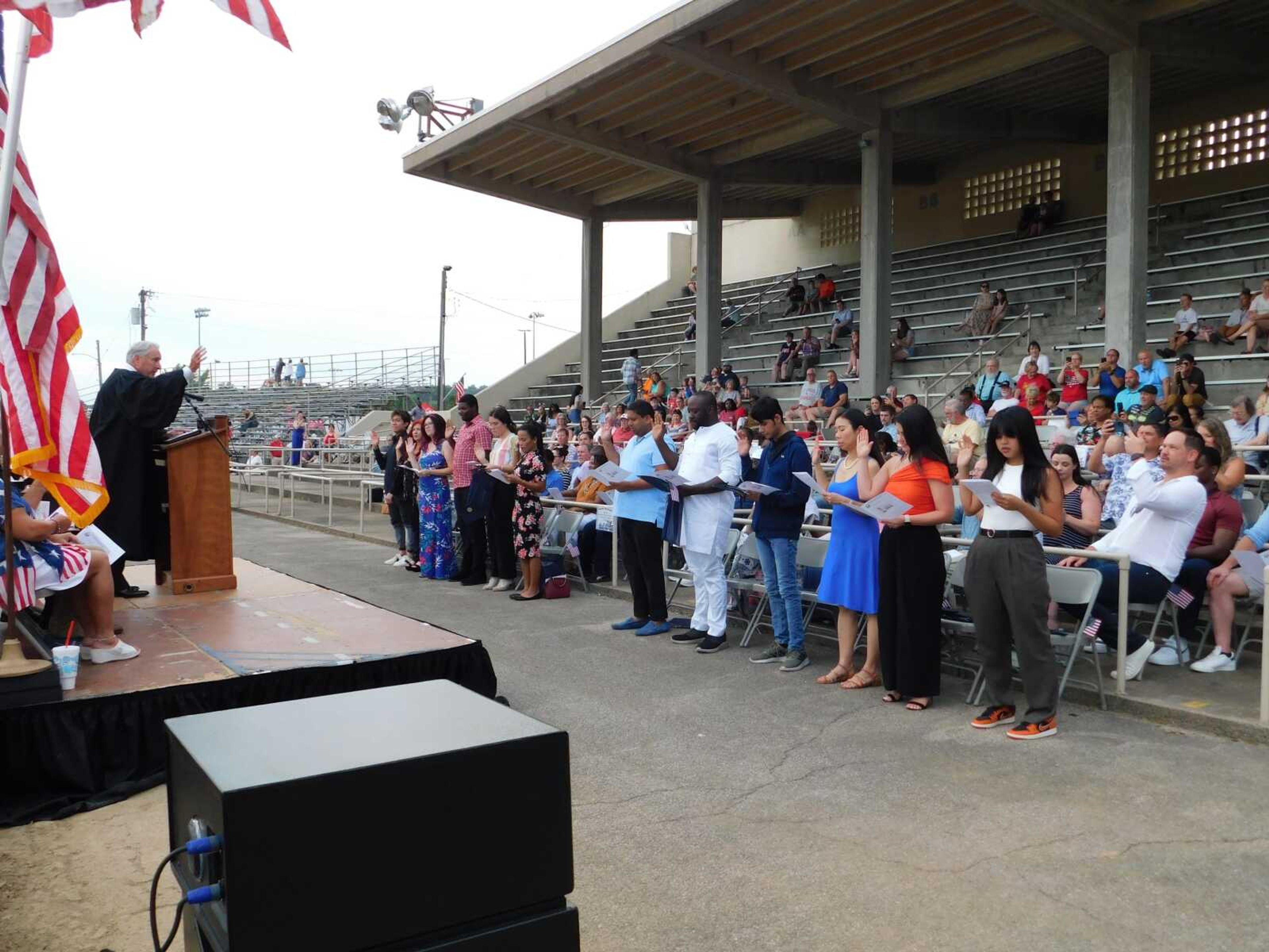 Twelve people from around the world take their Oath of Allegiance to become U.S. citizens at a naturalization ceremony led by U.S. District Judge for the Eastern District of Missouri Stephen N. Limbaugh Jr. The ceremony kicked off Cape Girardeau's Great American 4th of July event at Arena Park. More photos of the event are in a gallery at semissourian.com.