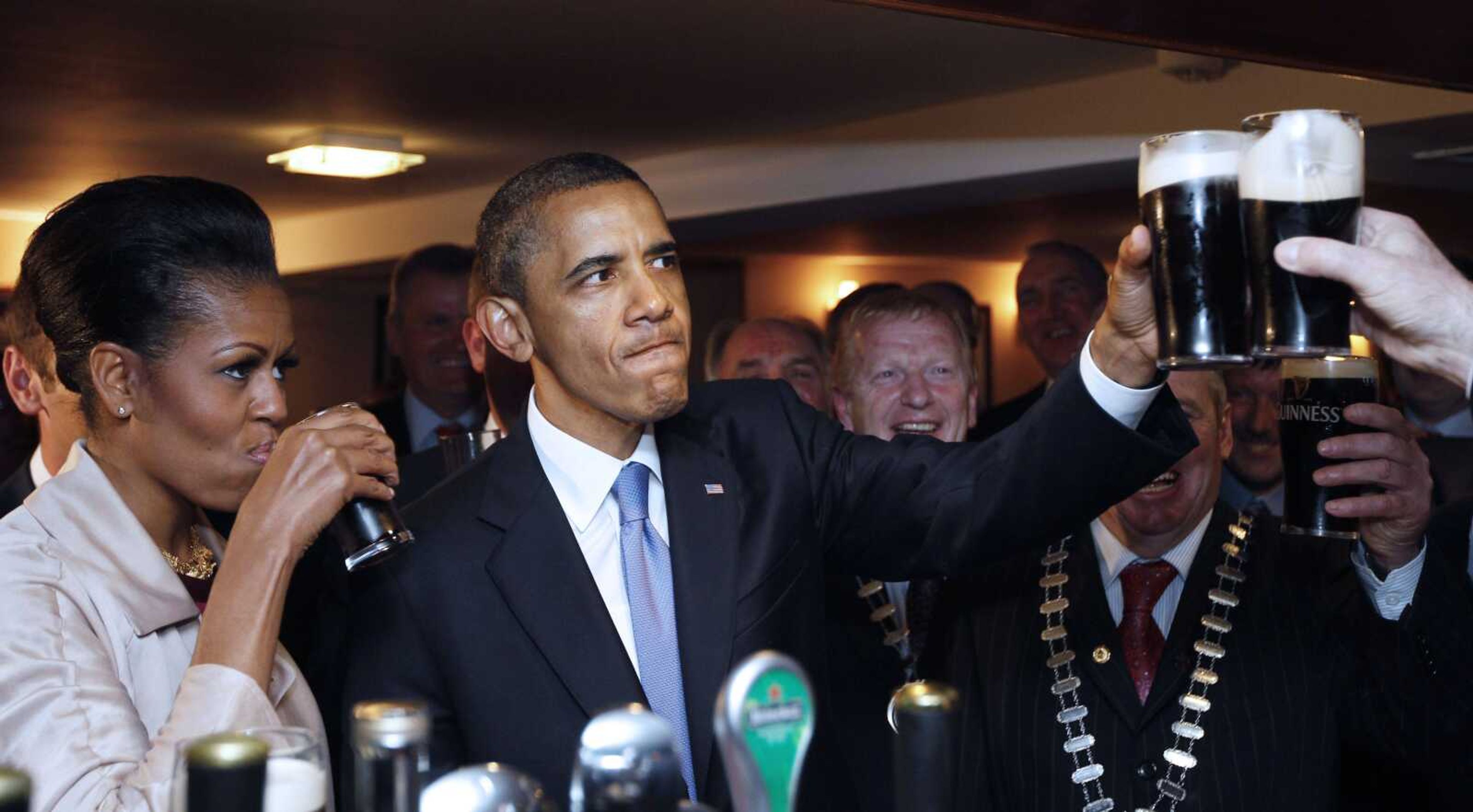 Charles Dharapak ~ Associated PressPresident Barack Obama and first lady Michelle Obama drink Guinness Monday as they meet with local residents at Ollie Hayes pub in Moneygall, Ireland, the ancestral homeland of his great-great-great-grandfather.