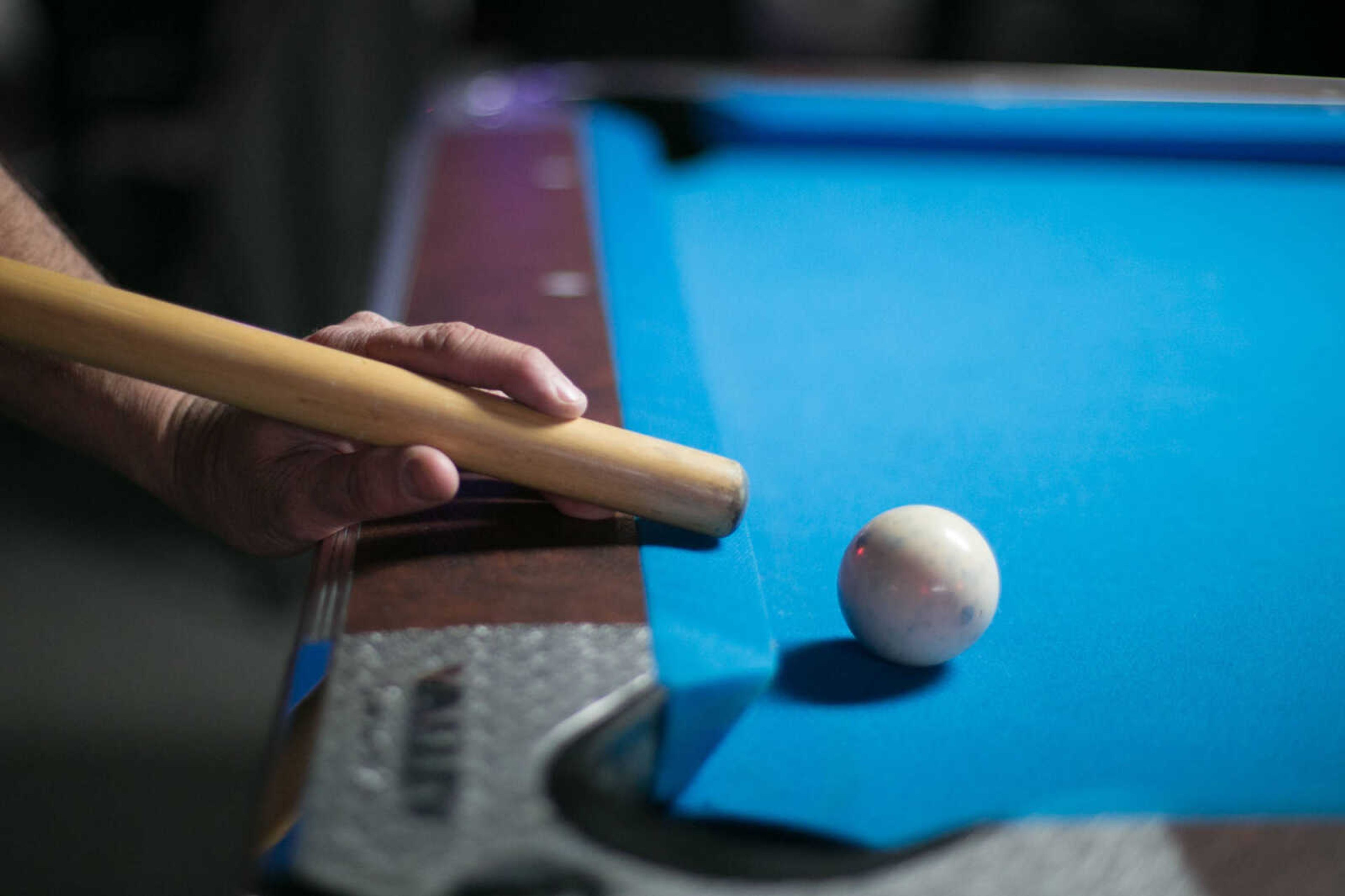 GLENN LANDBERG ~ glandberg@semissourian.com

A participant lines up a shot during the annual broomstick pool tournament Saturday, Feb. 27, 2016 at JR's Bar & Billiards in Cape Girardeau. Tournament Saturday, Feb. 27, 2016 at JR's Bar & Billiards in Cape Girardeau.