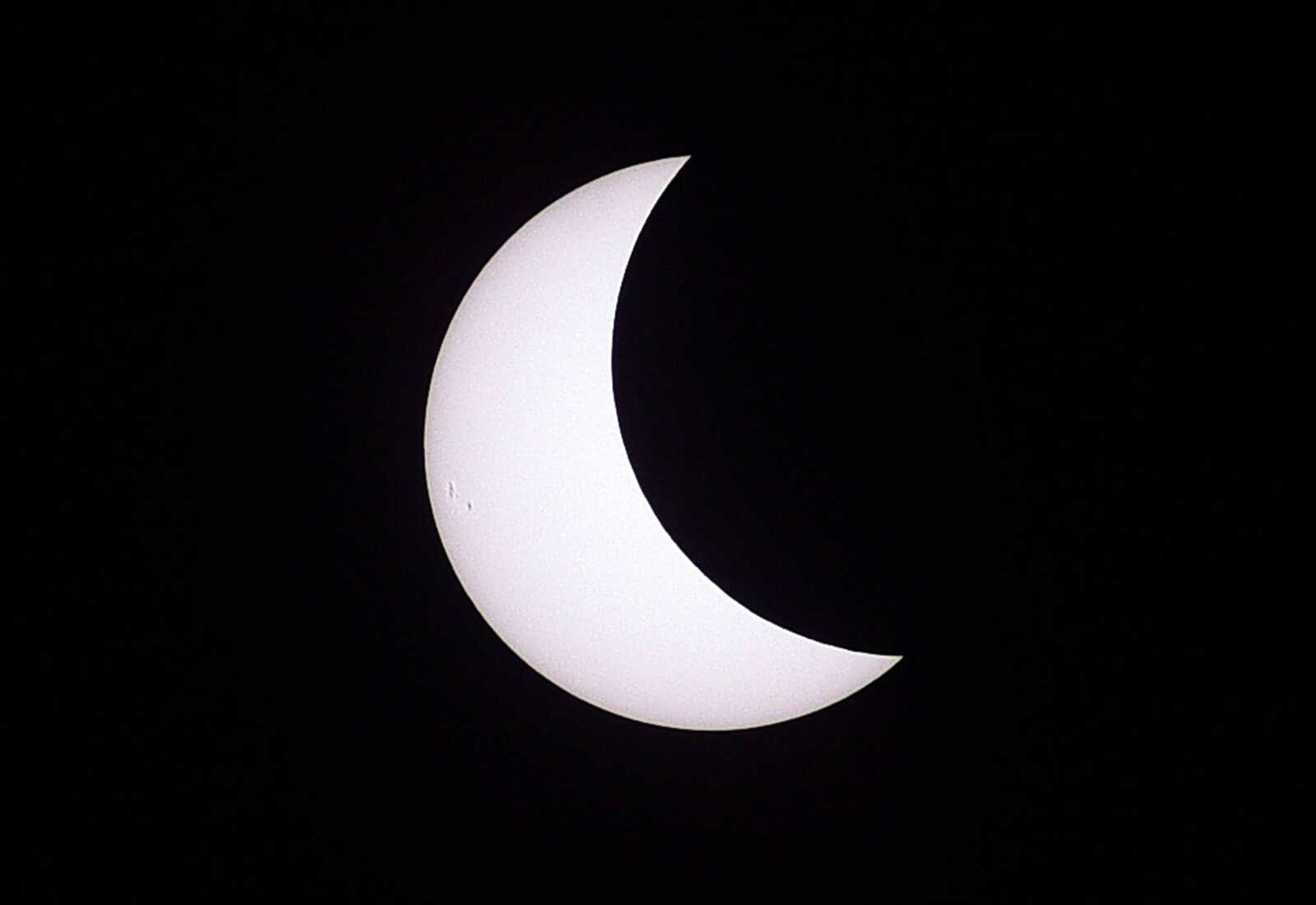 The sun takes on a crescent shape on Monday, Aug. 21, 2017, during the solar eclipse in Cape Girardeau.