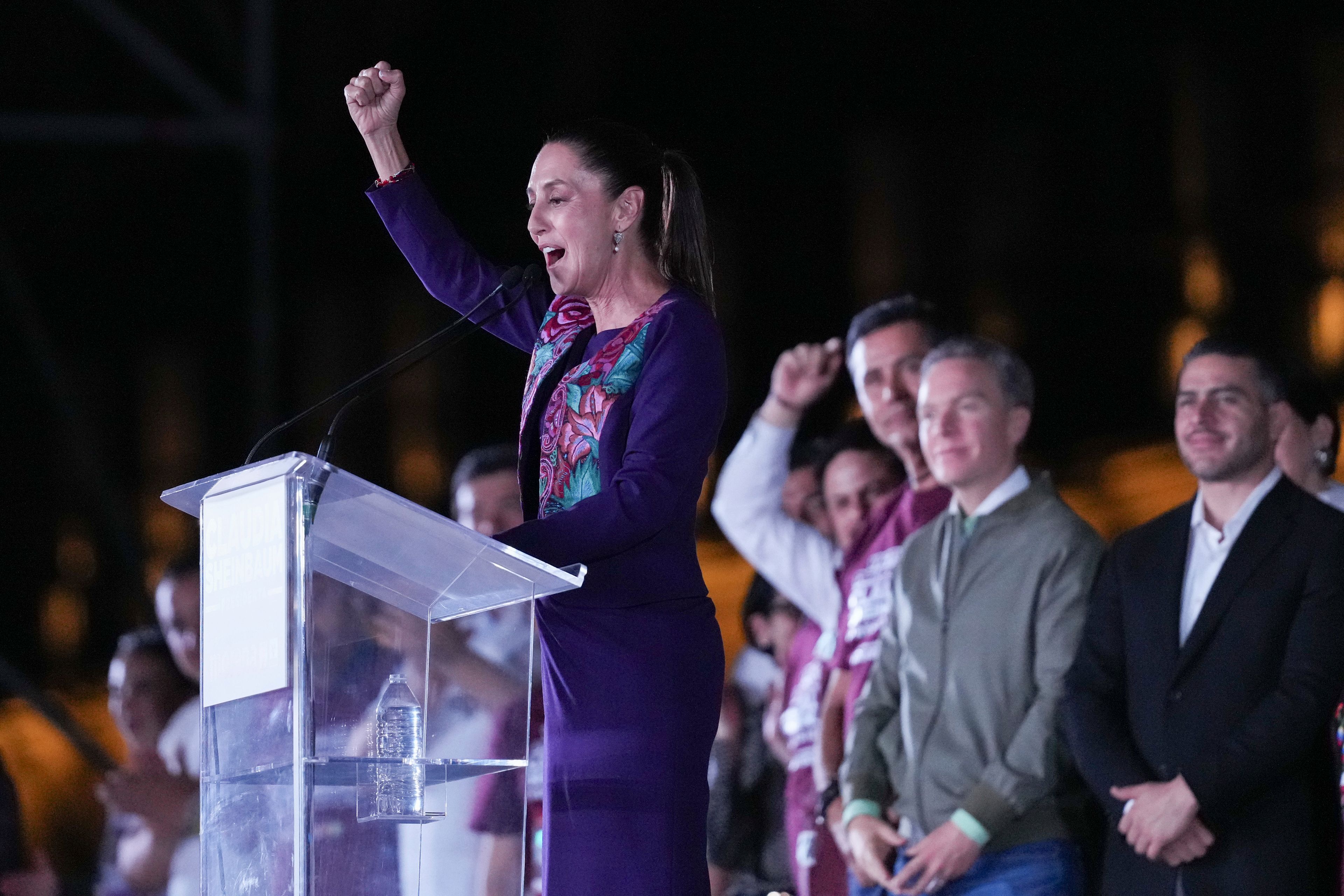 FILE - Ruling party presidential candidate Claudia Sheinbaum addresses supporters at the Zocalo, Mexico City's main square, after the National Electoral Institute announced she held an irreversible lead in the election, June 3, 2024. (AP Photo/Marco Ugarte, File)