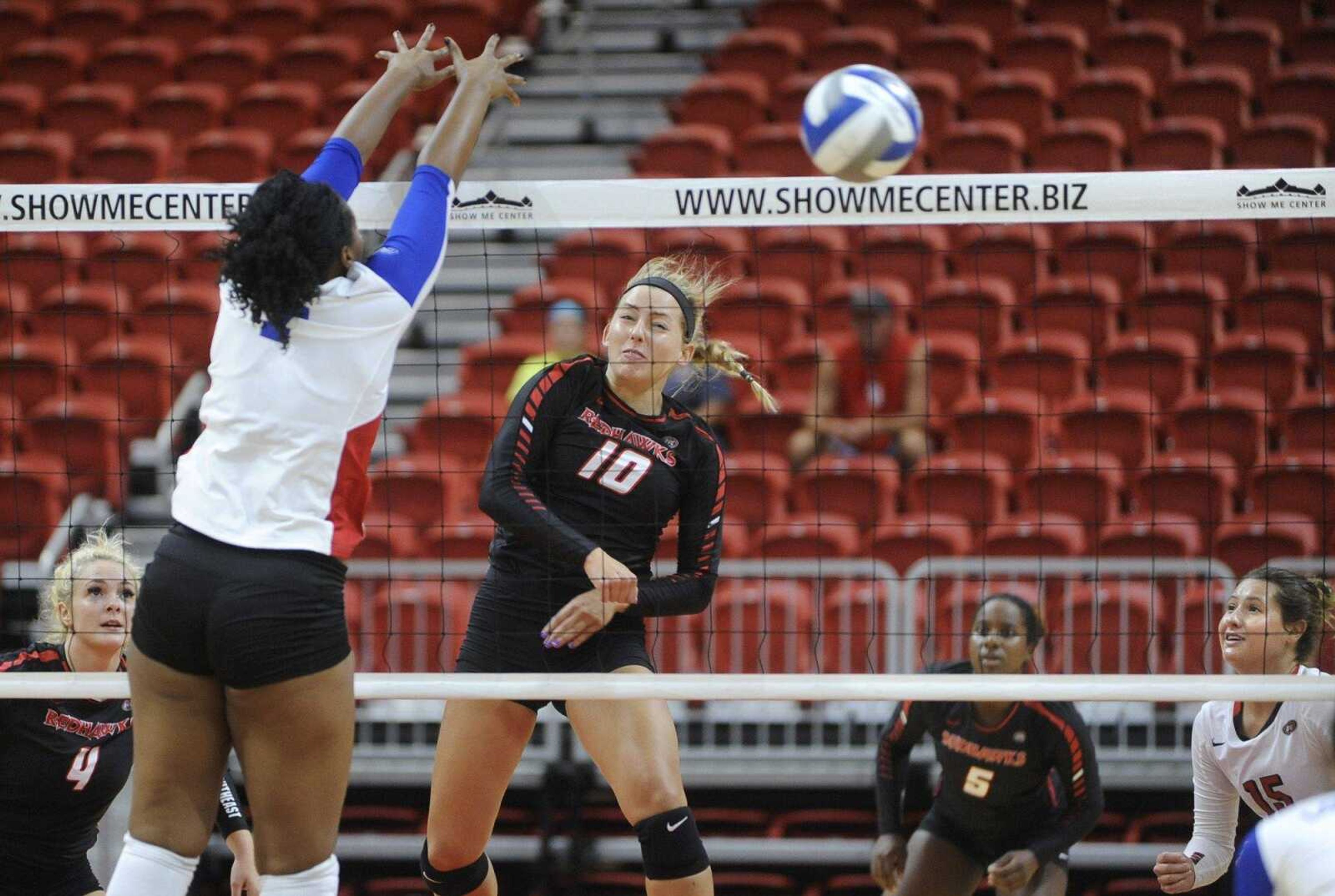 Southeast Missouri State outside hitter Madeline Grimm spikes the ball past Louisiana Tech's Alexa Lister during the first set Saturday, Aug. 27, 2016 at the Show Me Center.