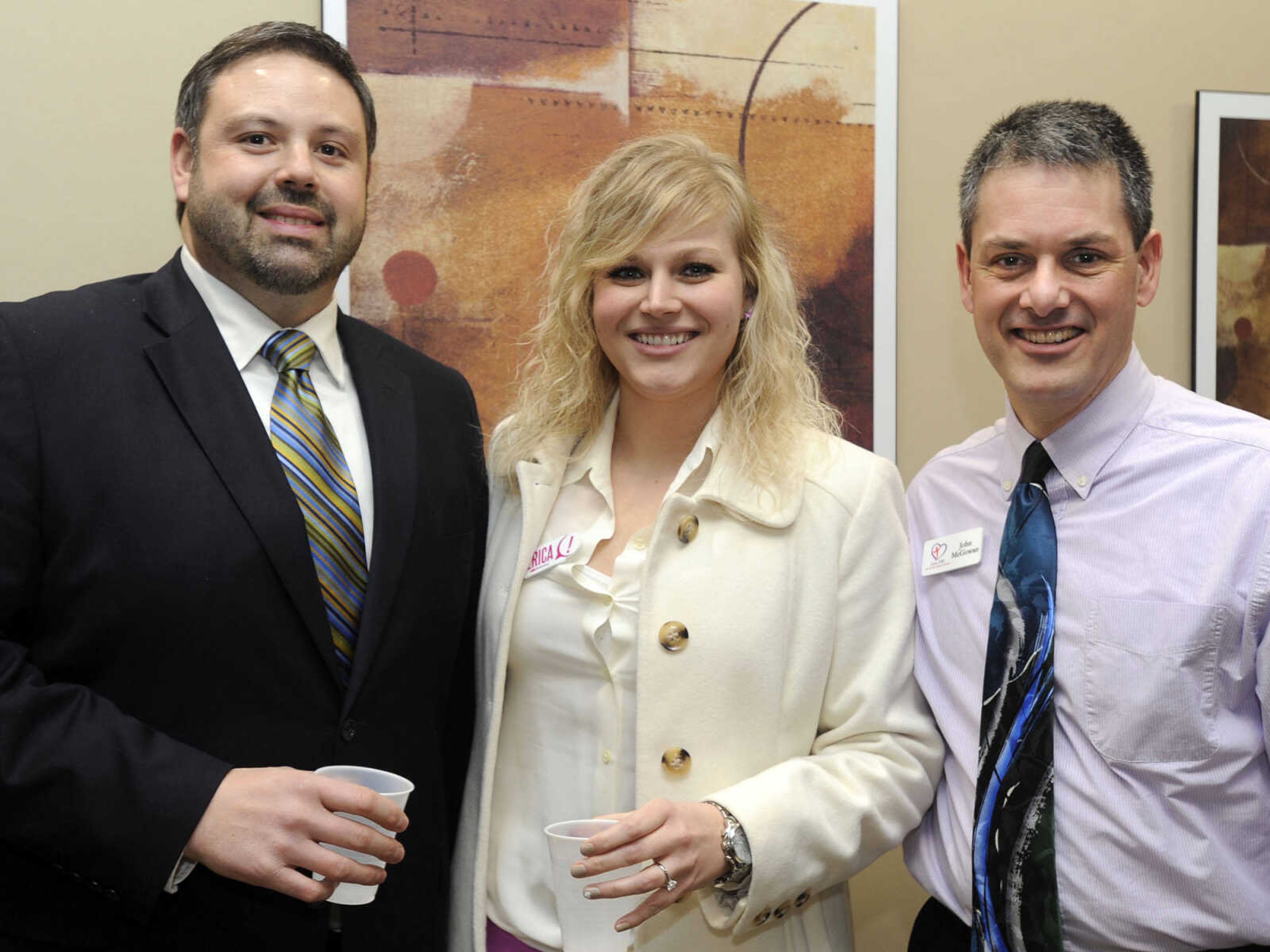 Dom Mastropierro, left, Wells Fargo Advisors; Erica Wheeler, BOLD Marketing; John McGowan, Love INC.