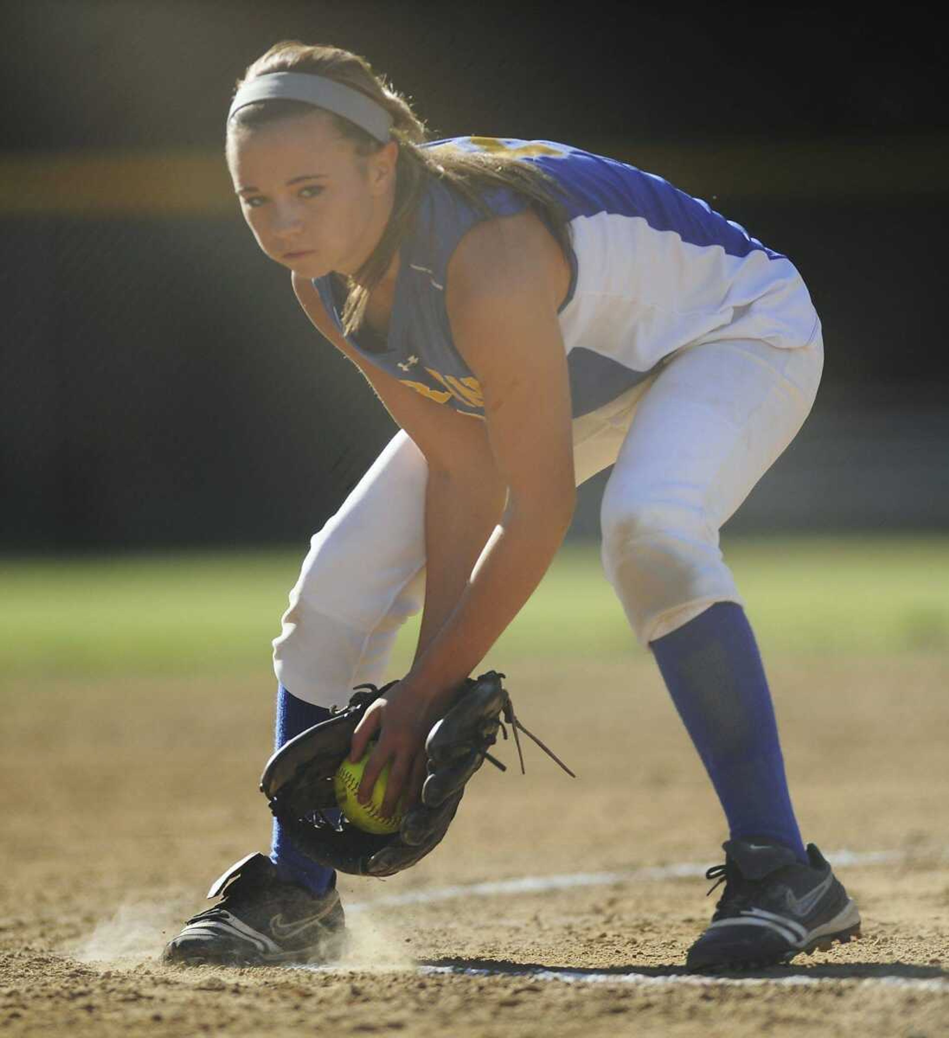 Oran pitcher Anna Jones fields a ground ball from Delta shortstop Machela VanGennip Wednesday. (ADAM VOGLER)