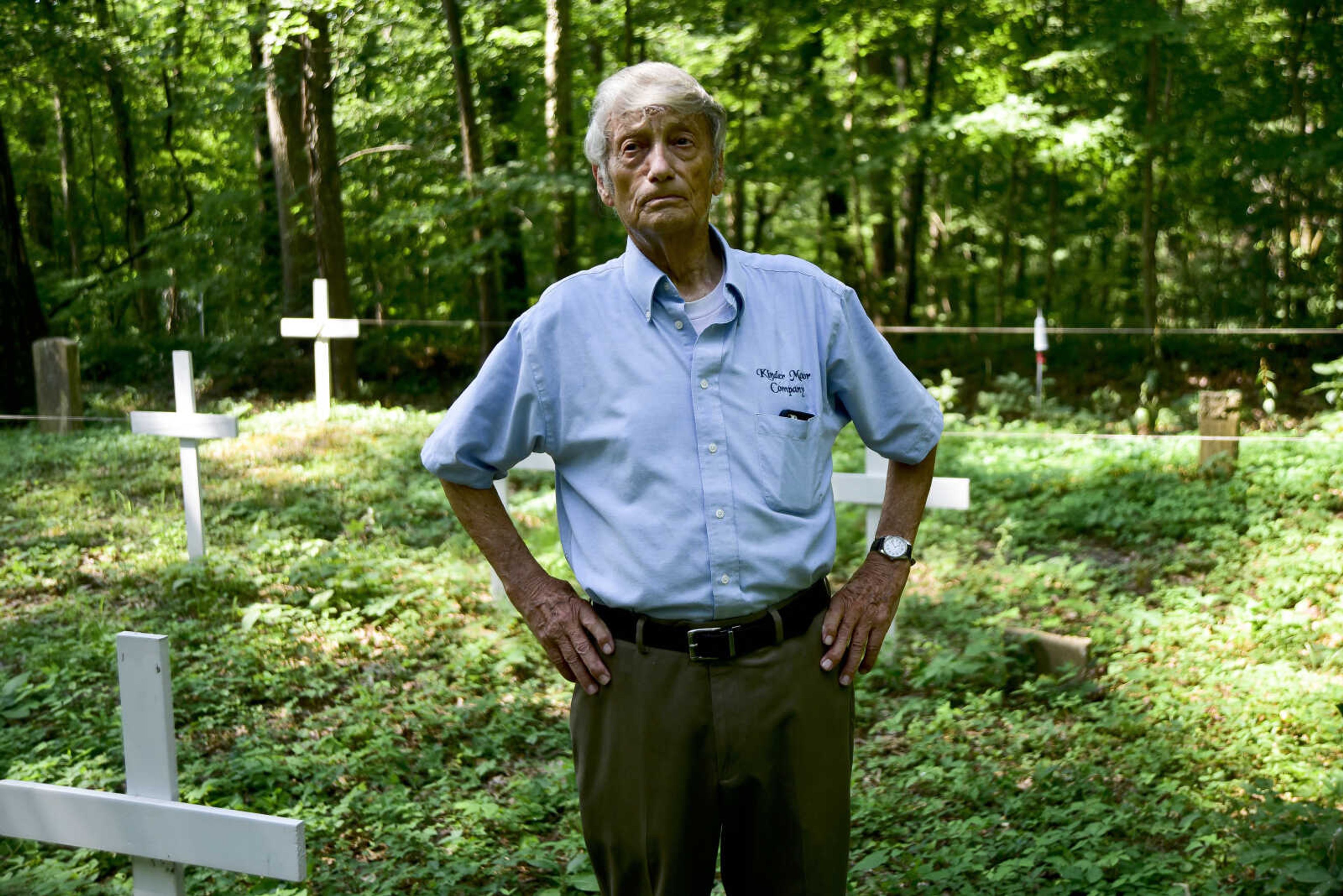 Elroy Kinder walks through Shady Grove Cemetery Friday, July 21, 2017 in Dutchtown