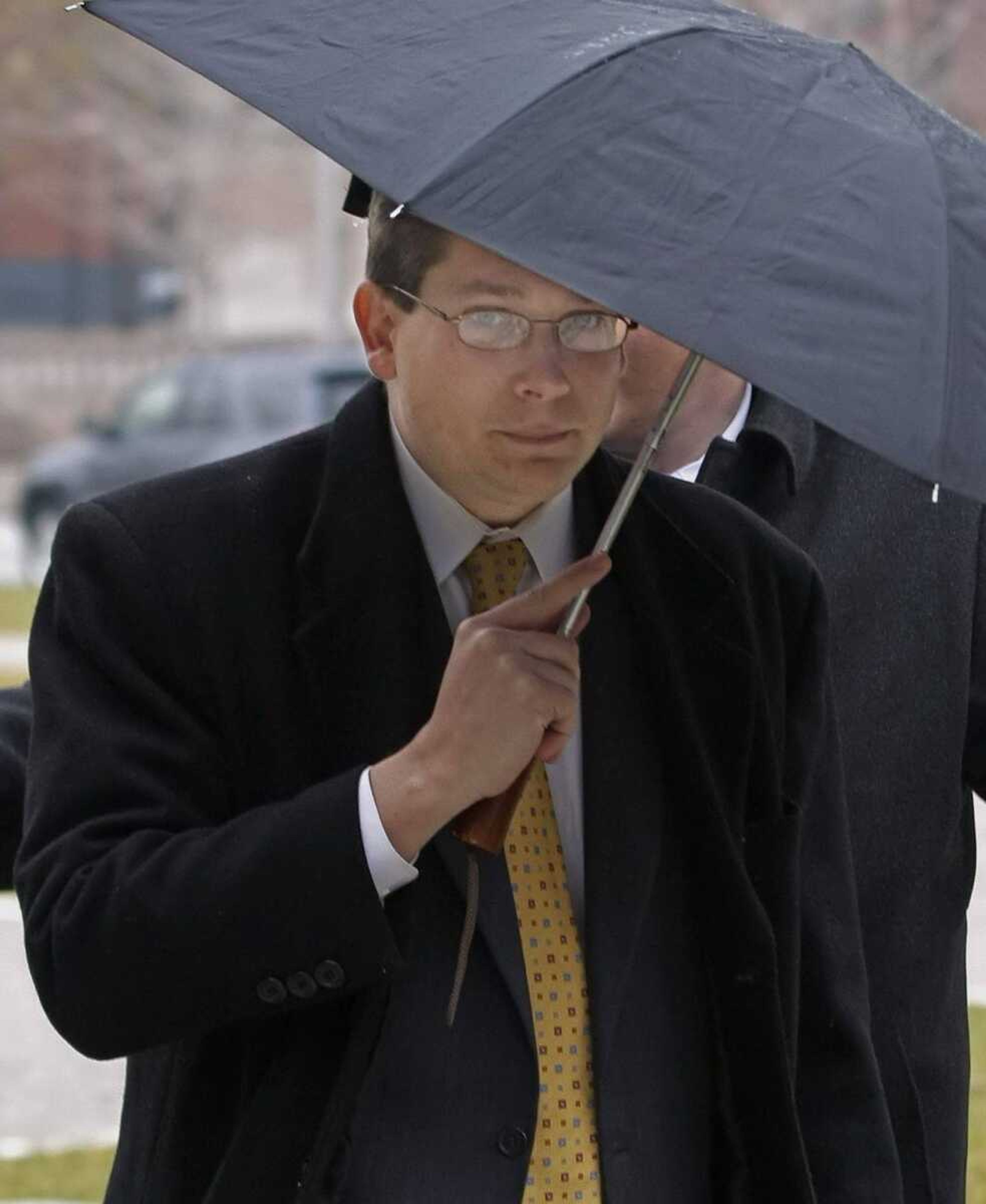 Former Missouri state representative Nathan Cooper left the Thomas Eagleton Federal courthouse in St. Louis on Monday after being sentenced to 15 months in prison for his part in an immigration fraud scheme. (Tom Gannam ~ Associated Press)