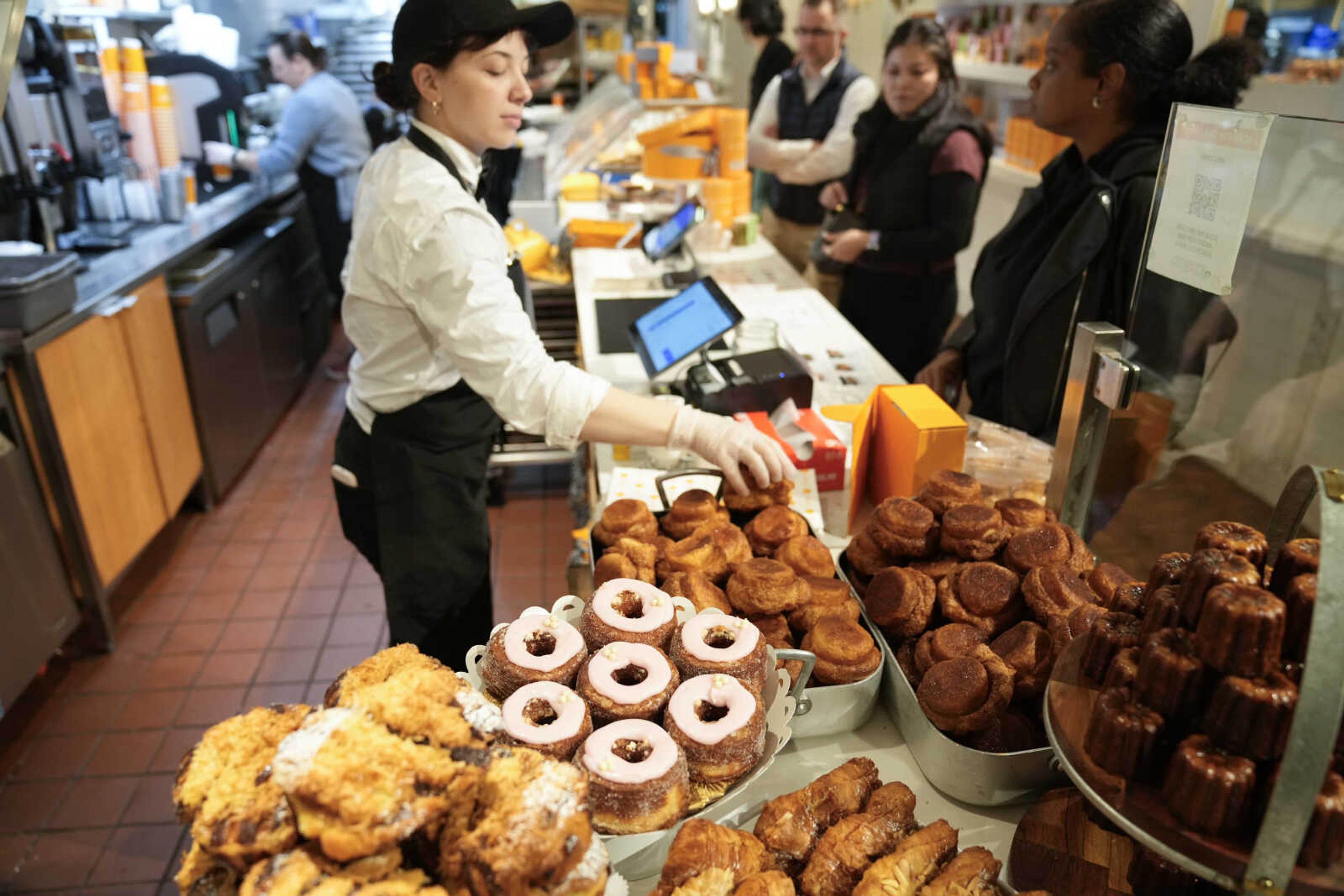 Cronuts, bottom center, are displayed with other pastries at Dominique Ansel Bakery on Sept. 28 in New York.