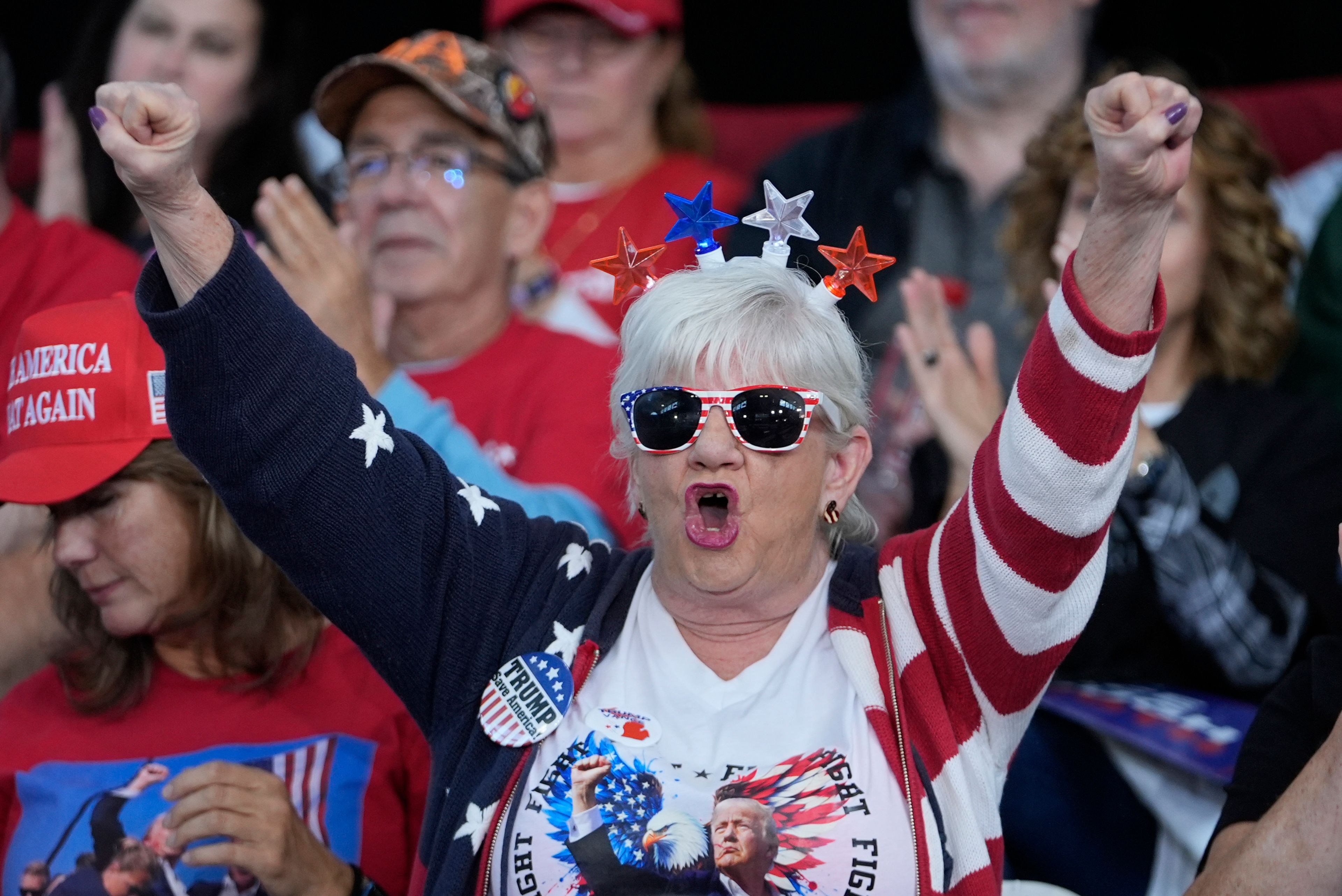 Supporters arrive before Republican vice presidential nominee Sen. JD Vance, R-Ohio speaks at a campaign event Eastern Market Tuesday, Oct. 8, 2024, in Detroit. (AP Photo/Paul Sancya)