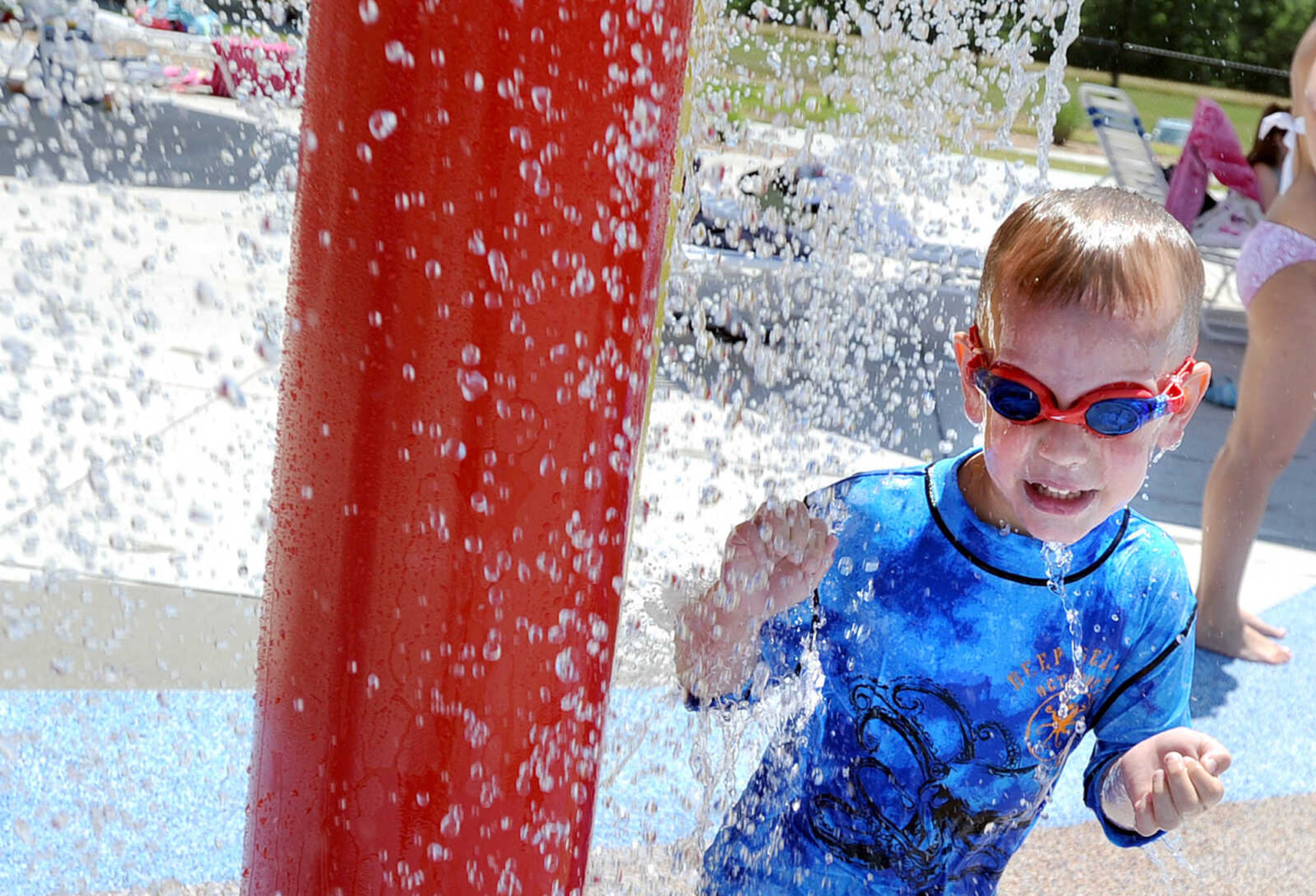 LAURA SIMON ~ lsimon@semissourian.com
Keegan Stritzel plays in the cool waters of the spray pad Tuesday, May 29, 2012 at Cape Splash in Cape Girardeau.