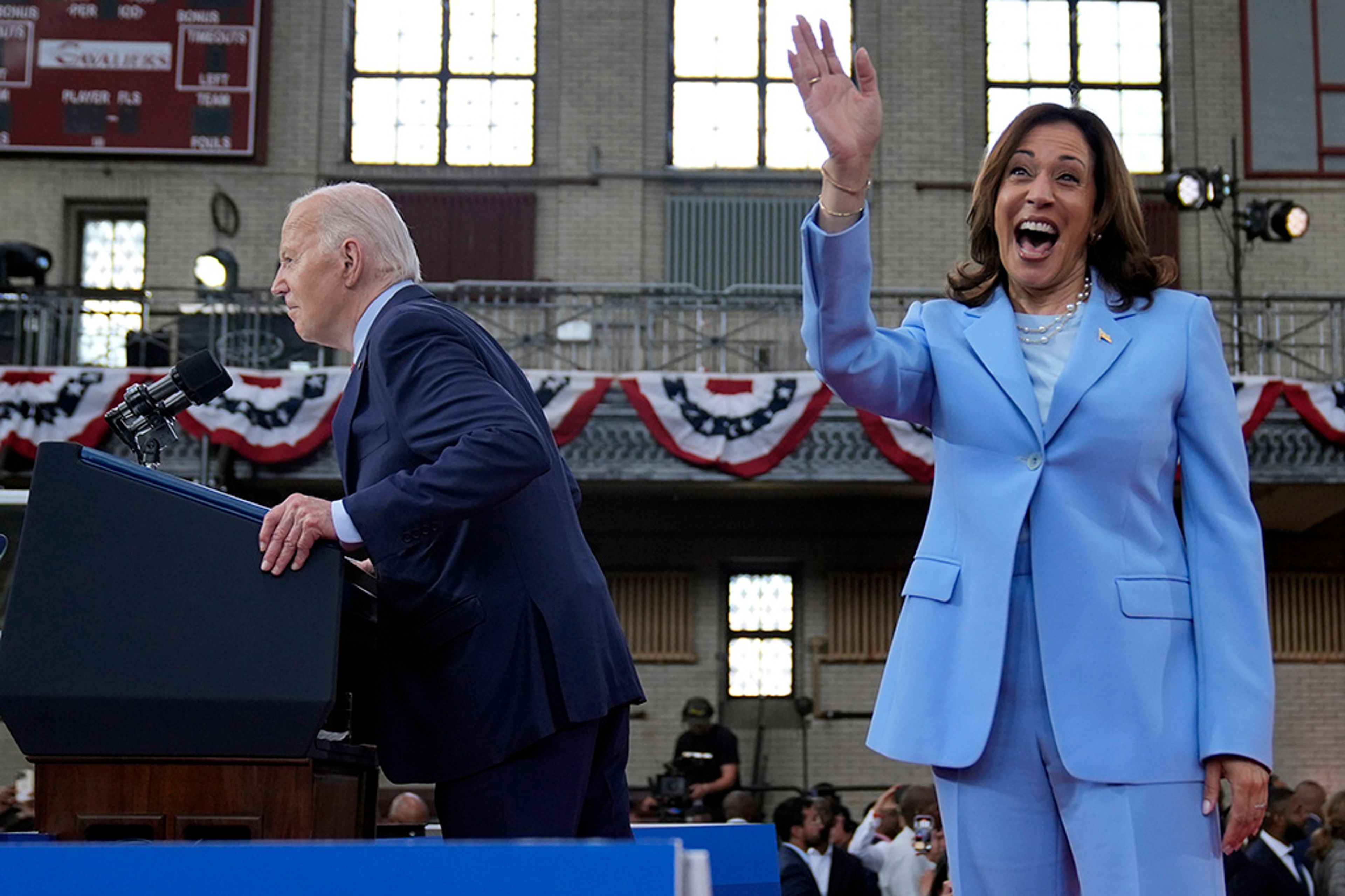 President Joe Biden speaks as Vice President Kamala Harris waves at a campaign event at Girard College, Wednesday, May 29, 2024, in Philadelphia.