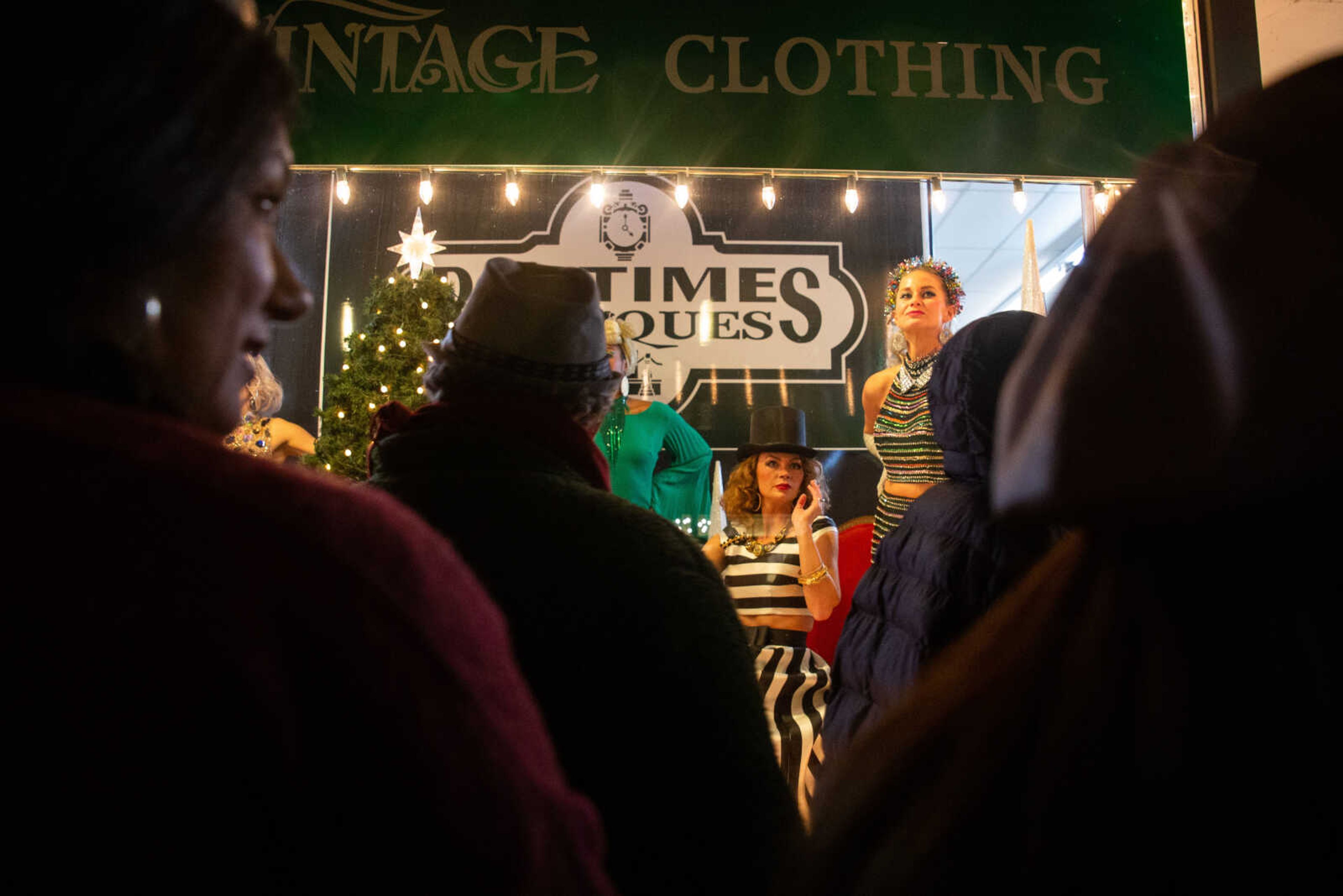 Living models pose in the windows of Pastimes Antiques&nbsp;&nbsp;on Friday, Dec. 2 in downtown Cape Girardeau.