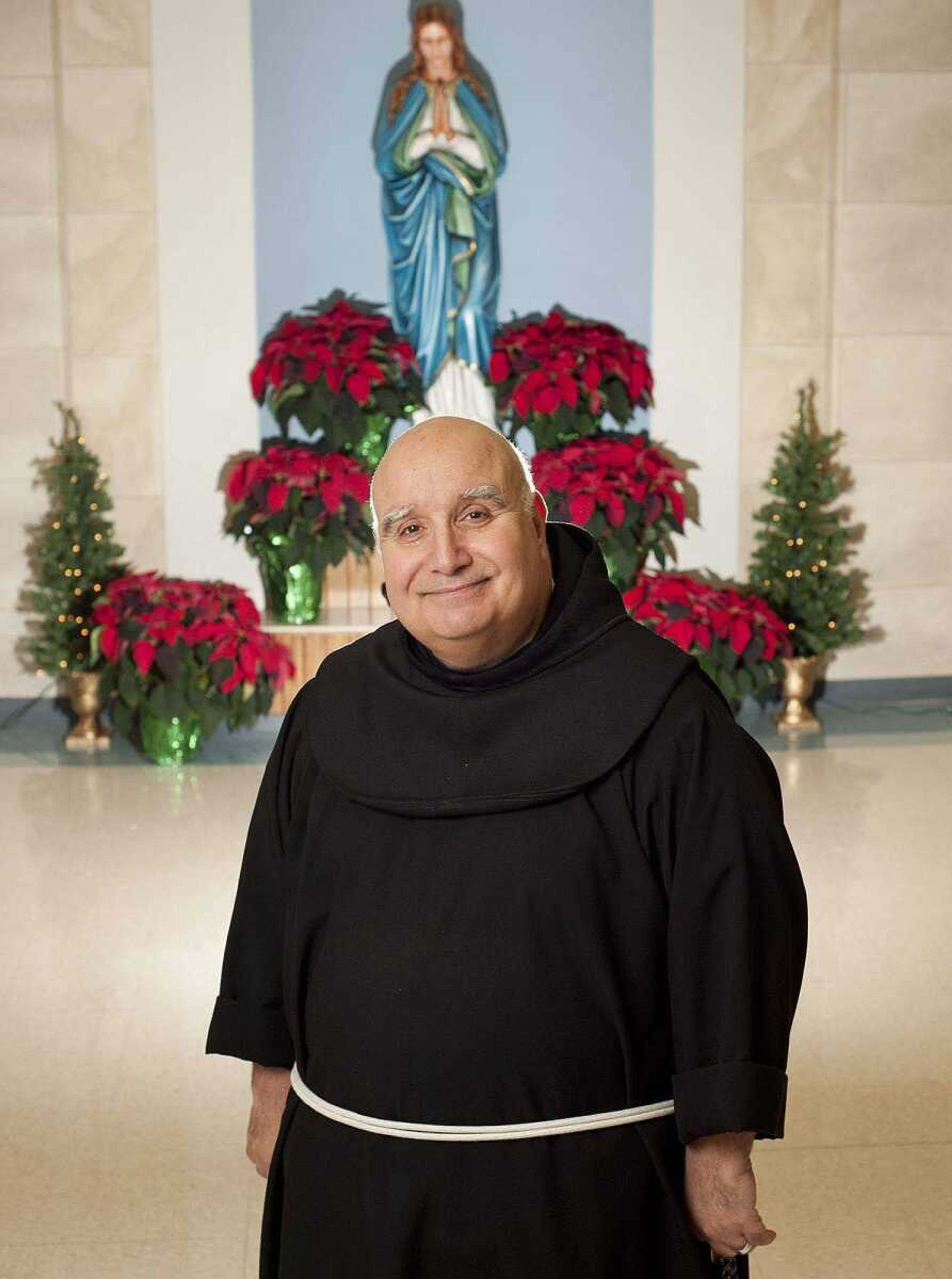 Notre Dame Regional High School principal Brother David Migliorino poses for a portrait Dec. 12, 2013, at the school.