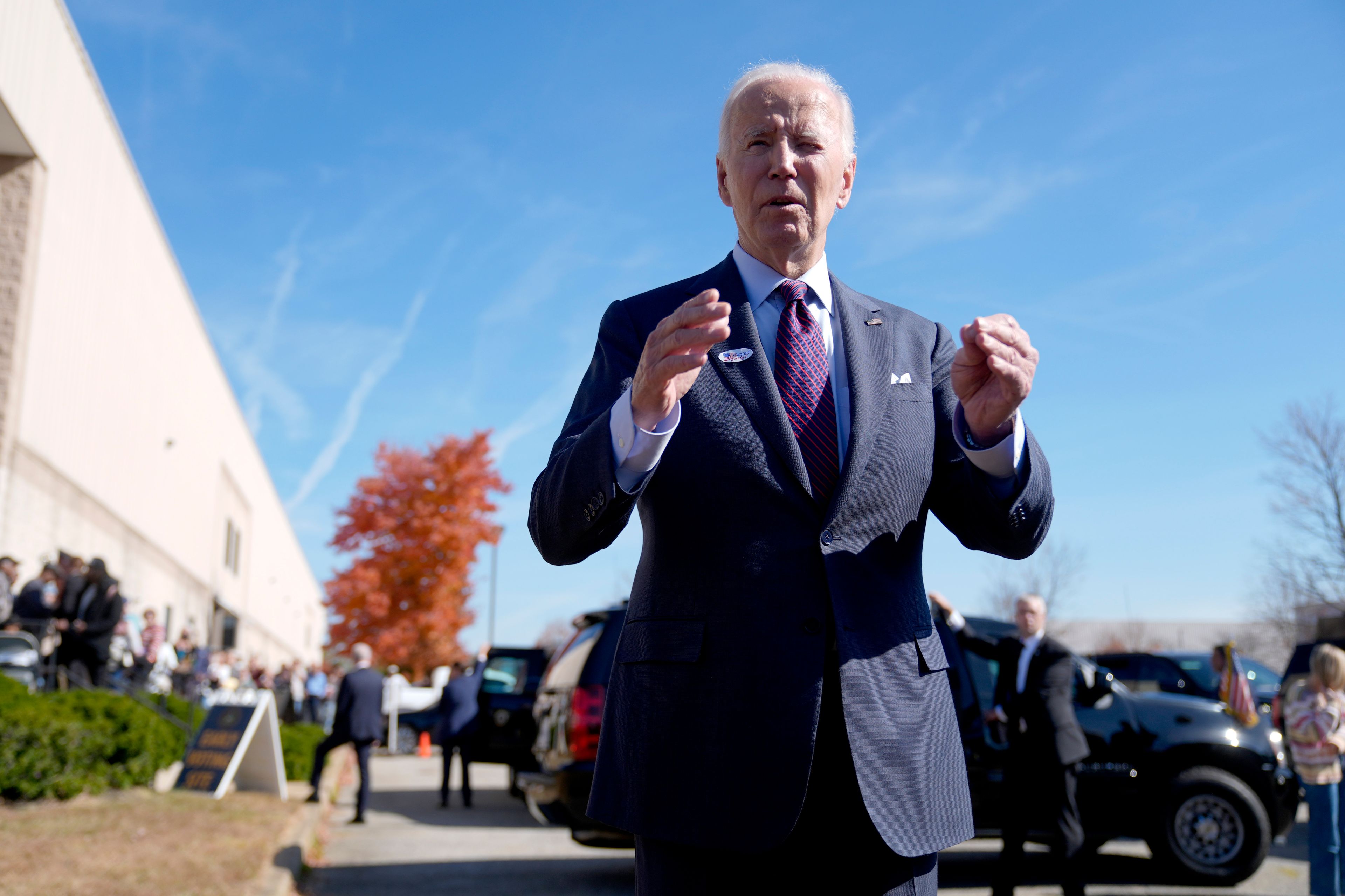 President Joe Biden speaks with reporters after casting his early-voting ballot for the 2024 general elections, Monday, Oct. 28, 2024, at a polling station in New Castle, Del. (AP Photo/Manuel Balce Ceneta)