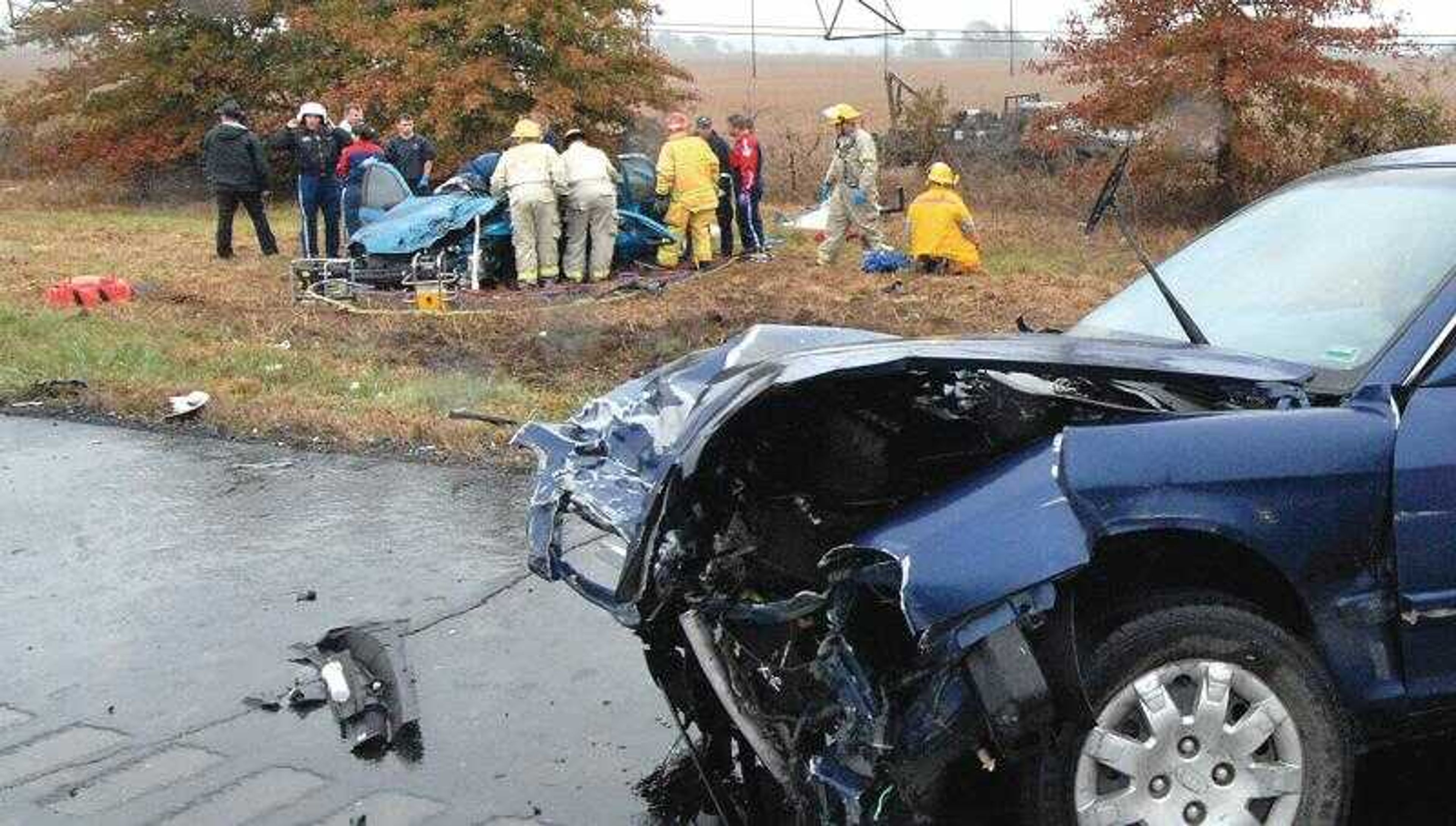 Emergency personnel extricated Rebecca L. Jackson, 30, of Farber, Mo., the driver of one of two vehicles involved in a head-on collision Thursday in the northbound lane of Interstate 55, near mile marker 78. Jackson was later pronounced dead at Saint Francis Medical Center. Tammy L. Rol, 37, of Benton, Mo., the driver of the blue Kia Optima, right, was not wearing a seat belt and was ejected from the vehicle. She was taken to Saint Francis in serious condition. (Don Frazier)