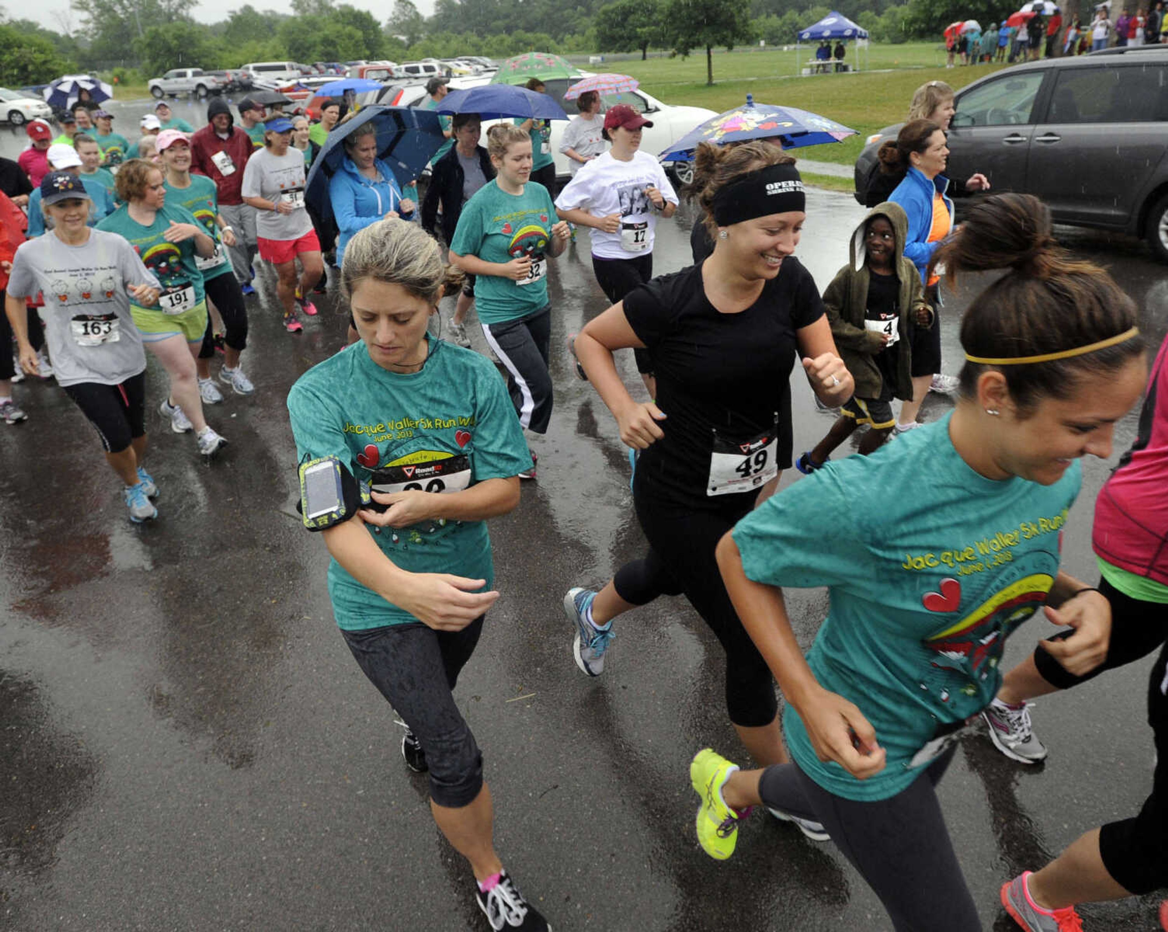 FRED LYNCH ~ flynch@semissourian.com
Runners begin the Jacque Waller 5K run Saturday, June 1, 2013 at Shawnee Park in Cape Girardeau.