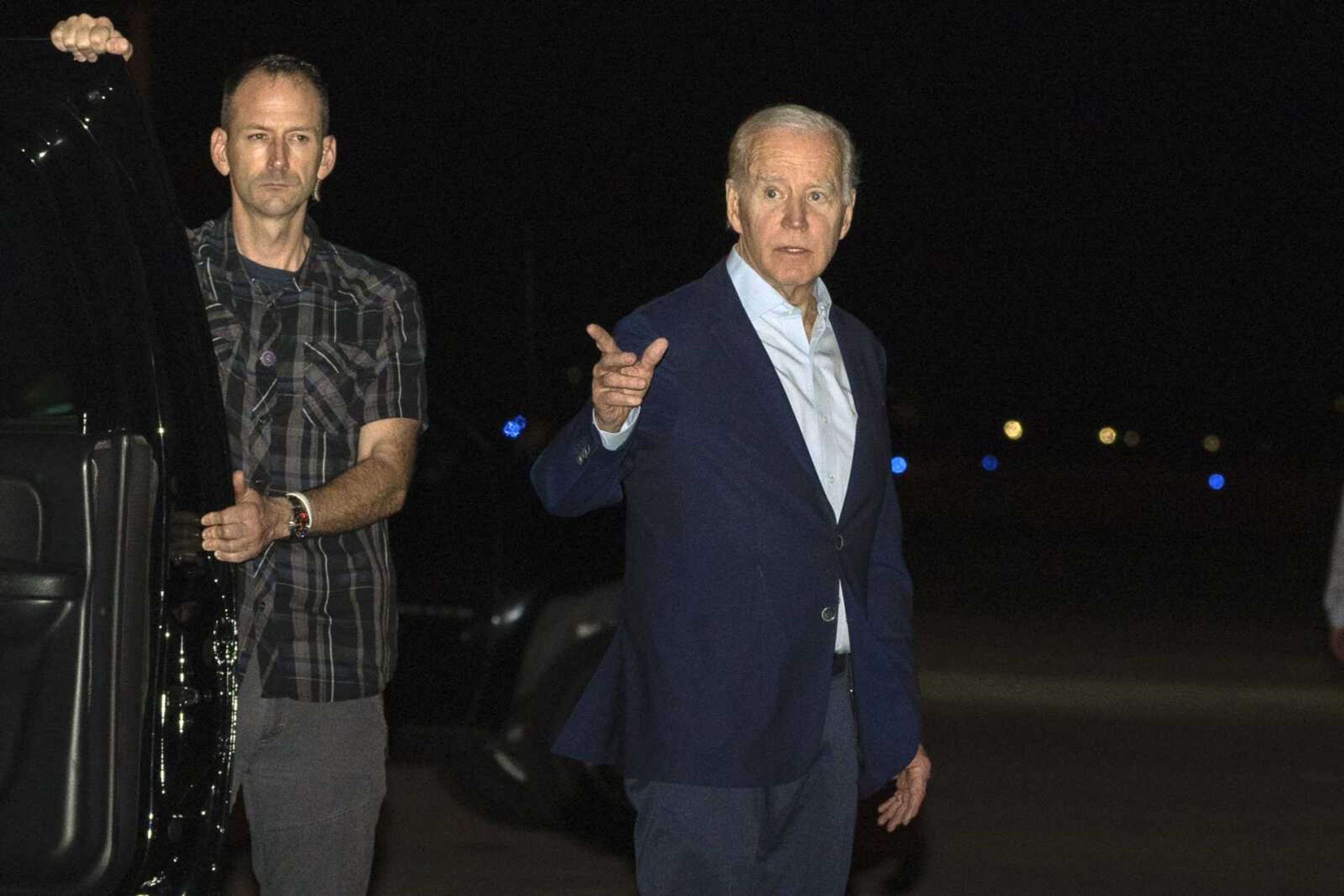 President Joe Biden arrives at Henry E. Rohlsen Airport on Tuesday, Dec. 27, in St. Croix, U.S. Virgin Islands. Biden on Thursday signed a $1.7 trillion spending bill that will keep the federal government operating through the end of the federal budget year in September 2023, and provide tens of billions of dollars in new aid to Ukraine for its fight against the Russian military.