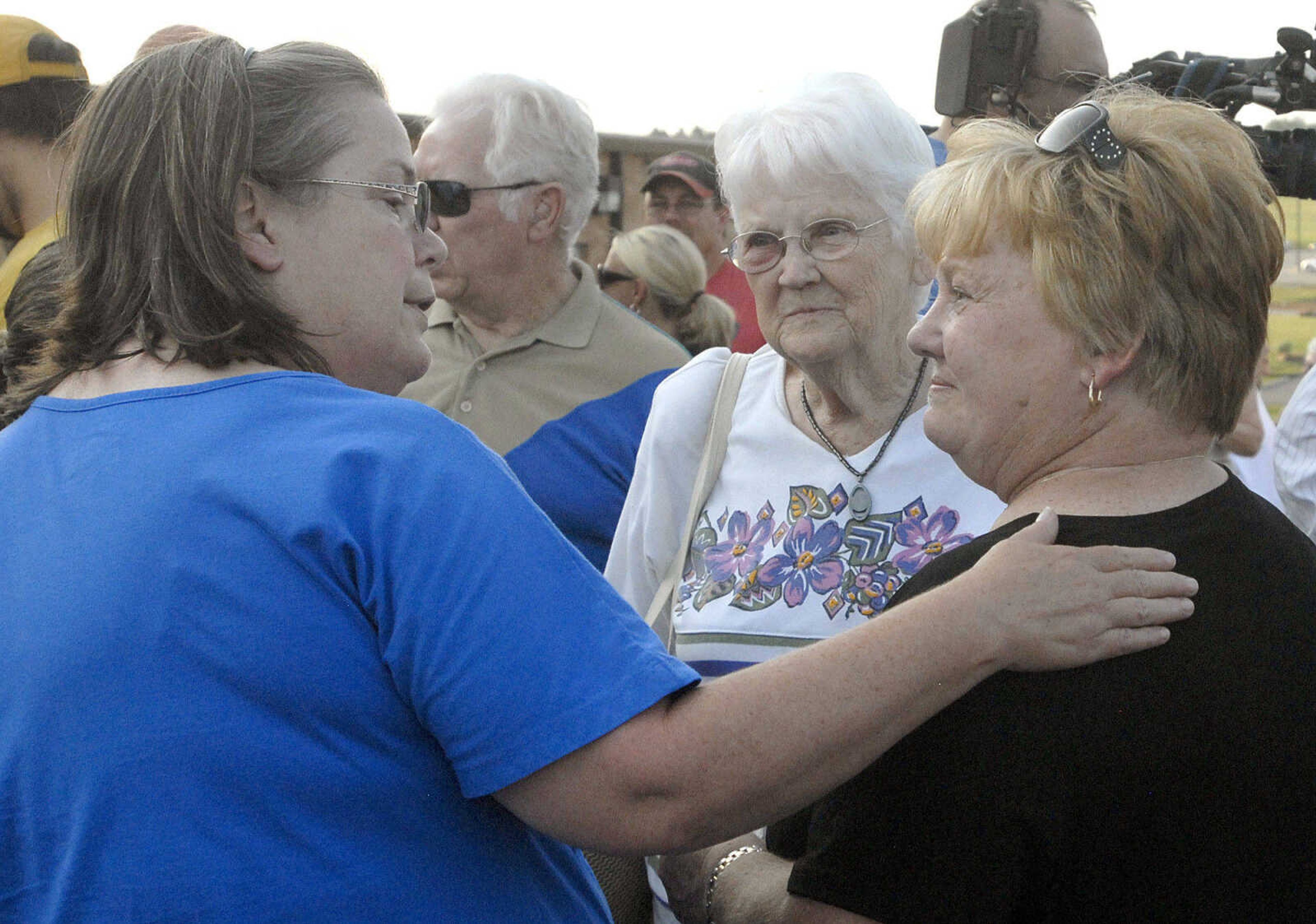 LAURA SIMON~lsimon@semissourian.com
Paula Stidham, left, and Beulah Matthews, center, console Ruby Rawson Thursday, June 9, 2011 during a prayer service for Rawson's daughter Jacque Sue Waller at Farmington High School. Waller, a 39-year-old mother of three, has been missing since June 1, 2011.