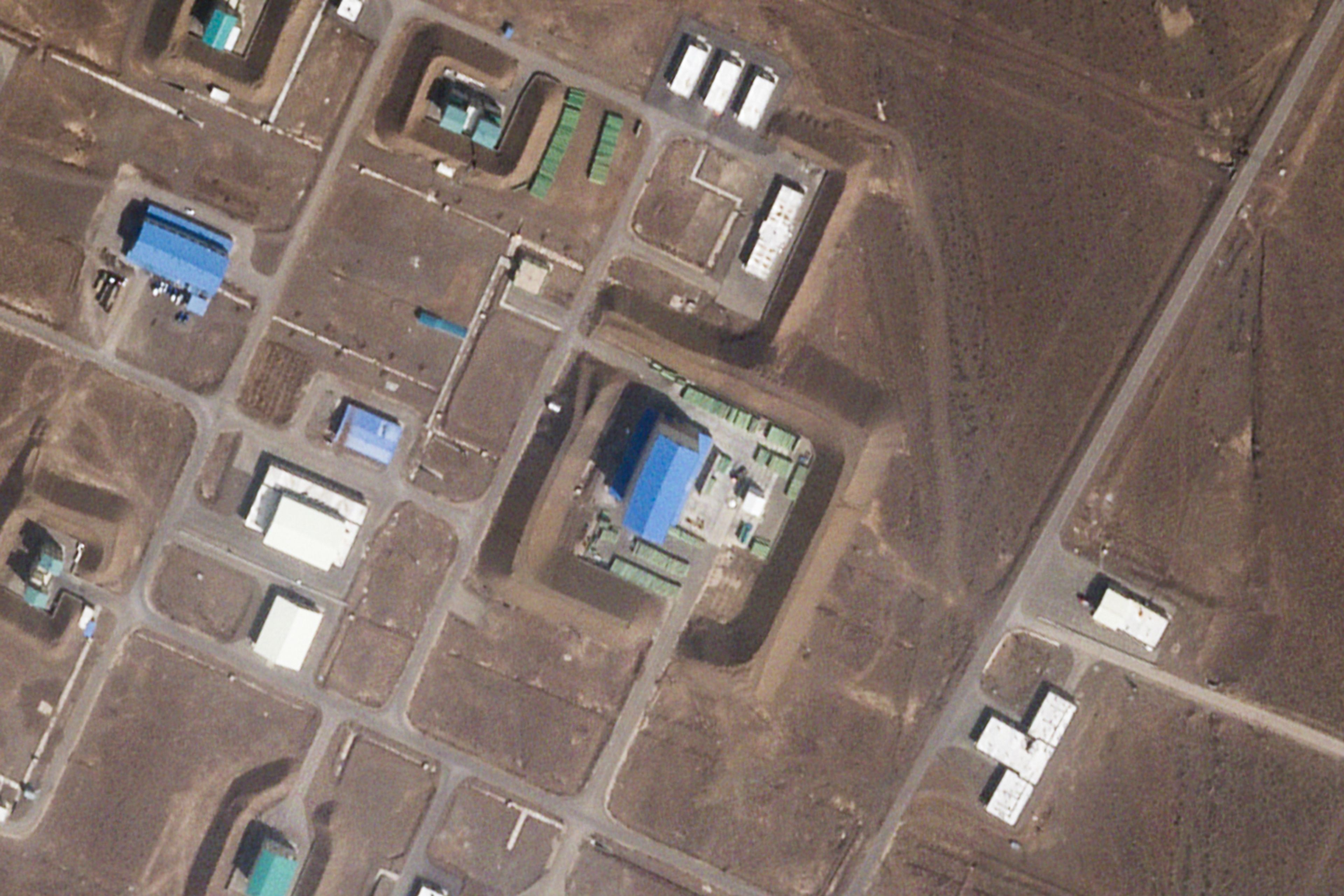 This satellite photo from Planet Labs PBC shows a large building at the Revolutionary Guard's Shahroud Space Center in Semnan province, Iran, March 19, 2024. Israel's attack on Iran likely damaged a base run by the paramilitary Revolutionary Guard that builds ballistic missiles and launches rockets as part of its own space program, satellite images analyzed by The Associated Press on Tuesday, Oct. 29, 2024, showed. (Planet Labs PBC via AP)