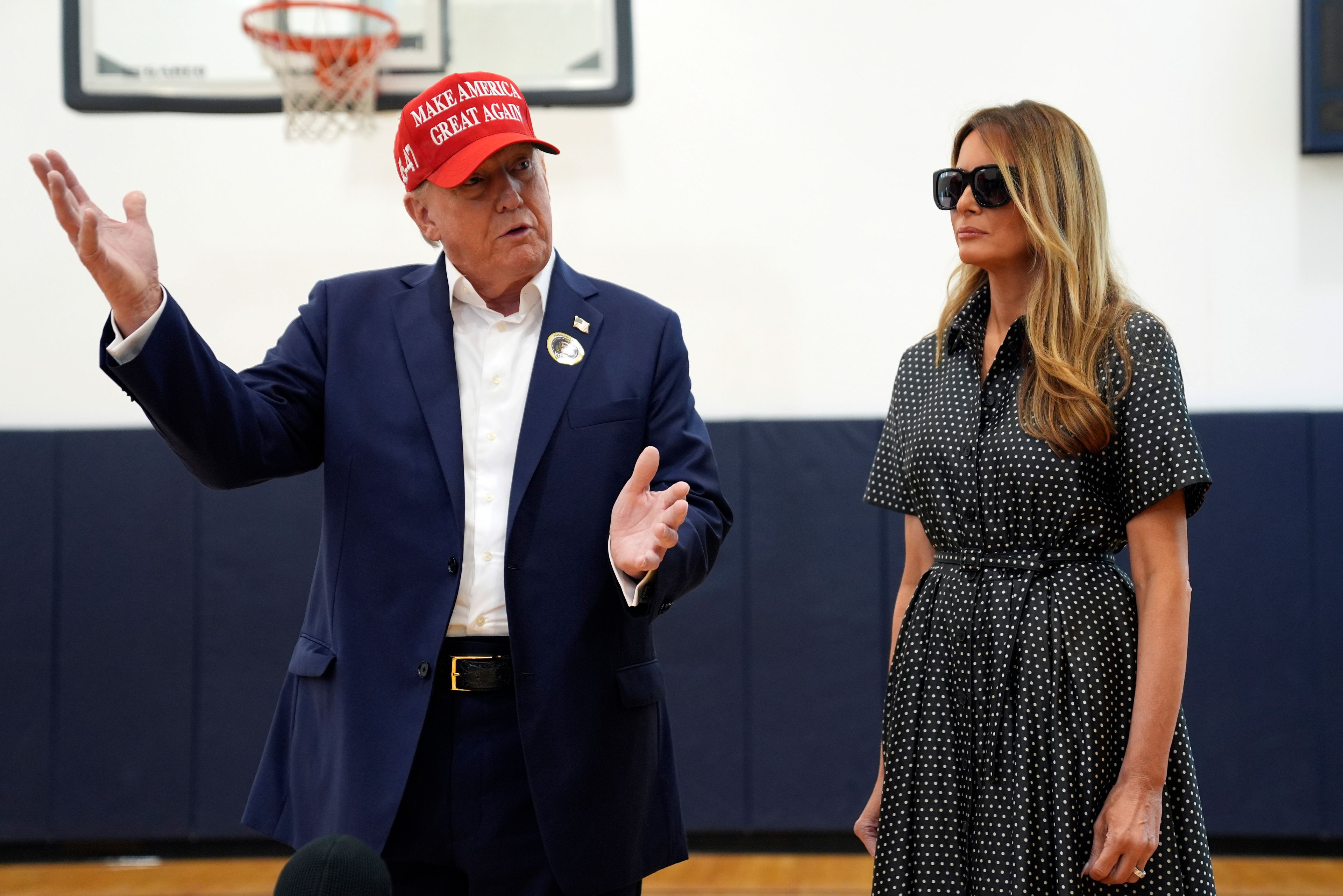 Republican presidential nominee former President Donald Trump speaks as former first lady Melania Trump listens after they voted on Election Day at the Morton and Barbara Mandel Recreation Center, Tuesday, Nov. 5, 2024, in Palm Beach, Fla. (AP Photo/Evan Vucci)