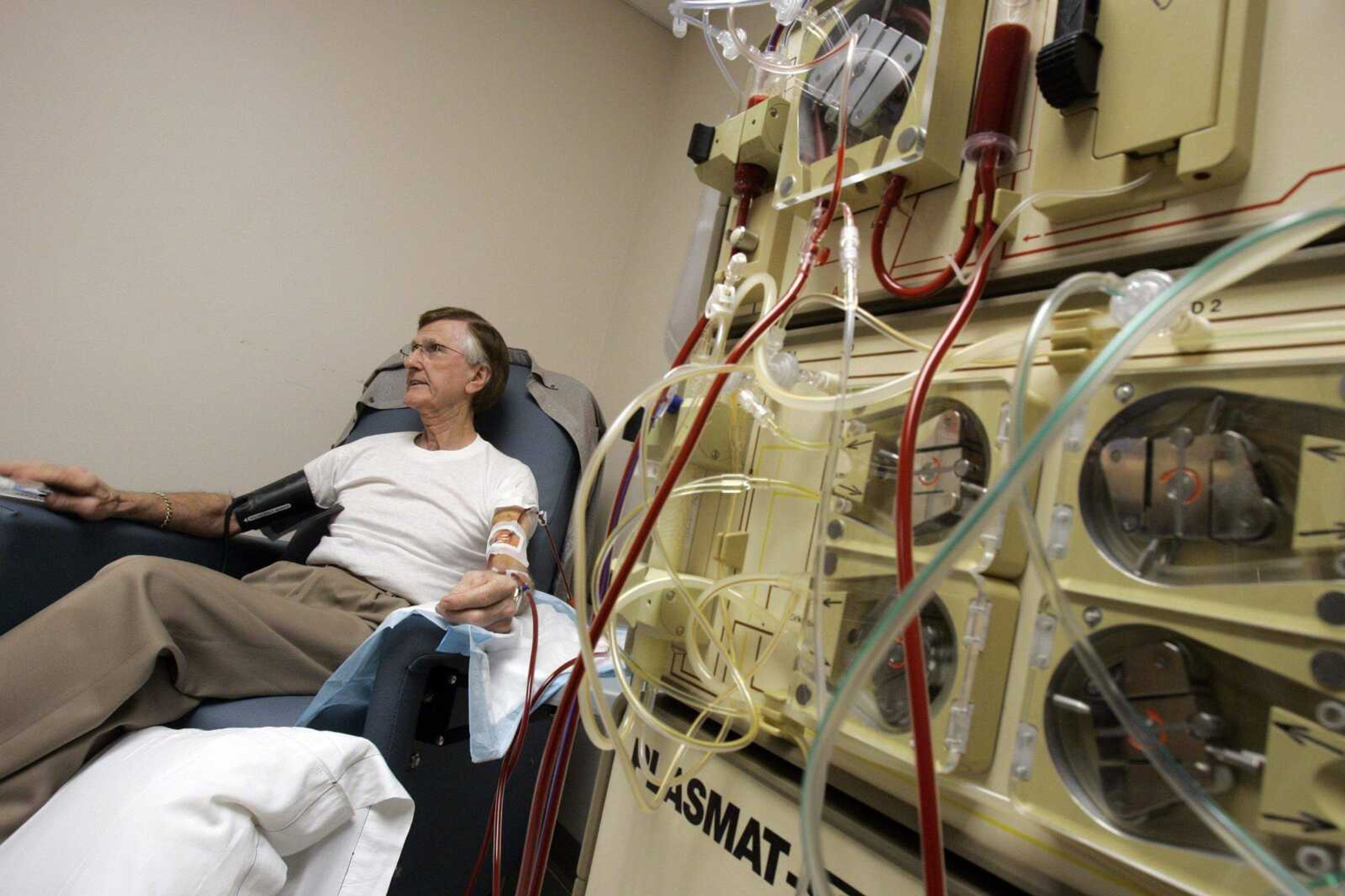 Jeff Roberson ~ Associated Press
Ted Harrison undergoes a cholesterol-lowering treatment by having blood removed from his body, his bad LDL cholesterol filtered out, and the newly cleaned plasma returned with his red blood cells back to his system at Barnes-Jewish Hospital in St. Louis.