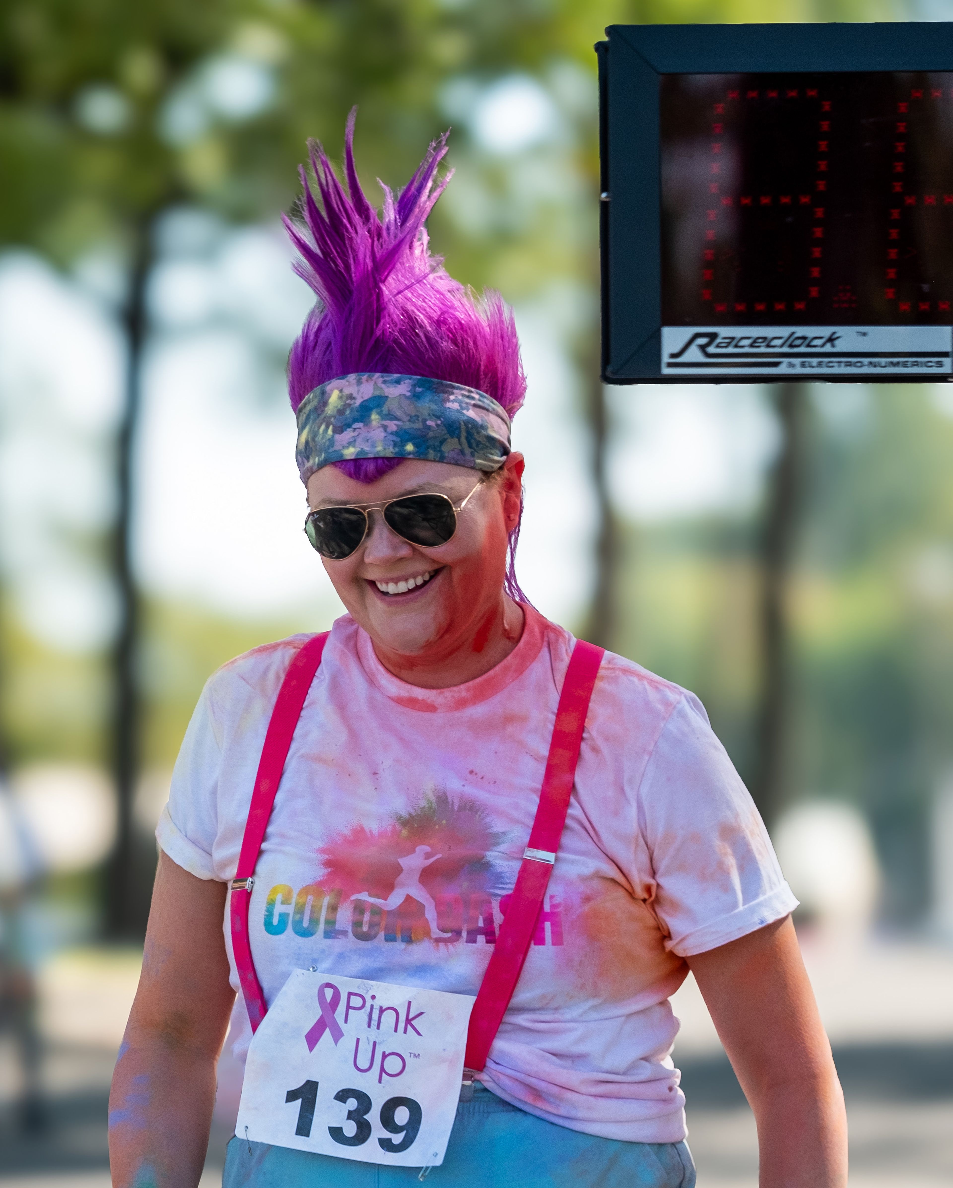 Miranda Sullivan of Gordonville beams as she crosses the finish line.
