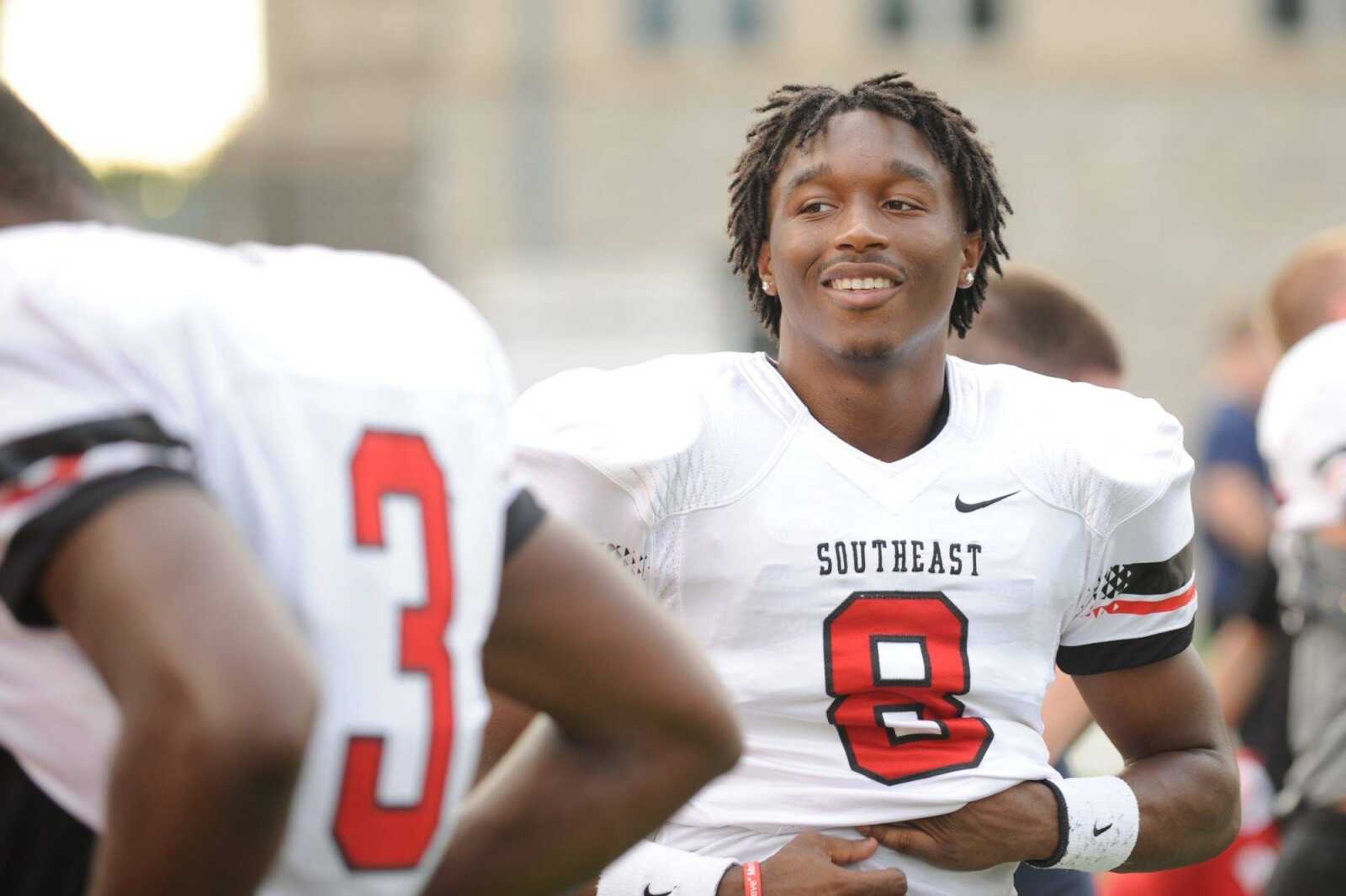 Bryan Lewis from Arlington, Tennessee puts on a Southeast Missouri State University football jersey during a football prospect camp at Houck Stadium, Friday, June 5, 2015. (Glenn Landberg)